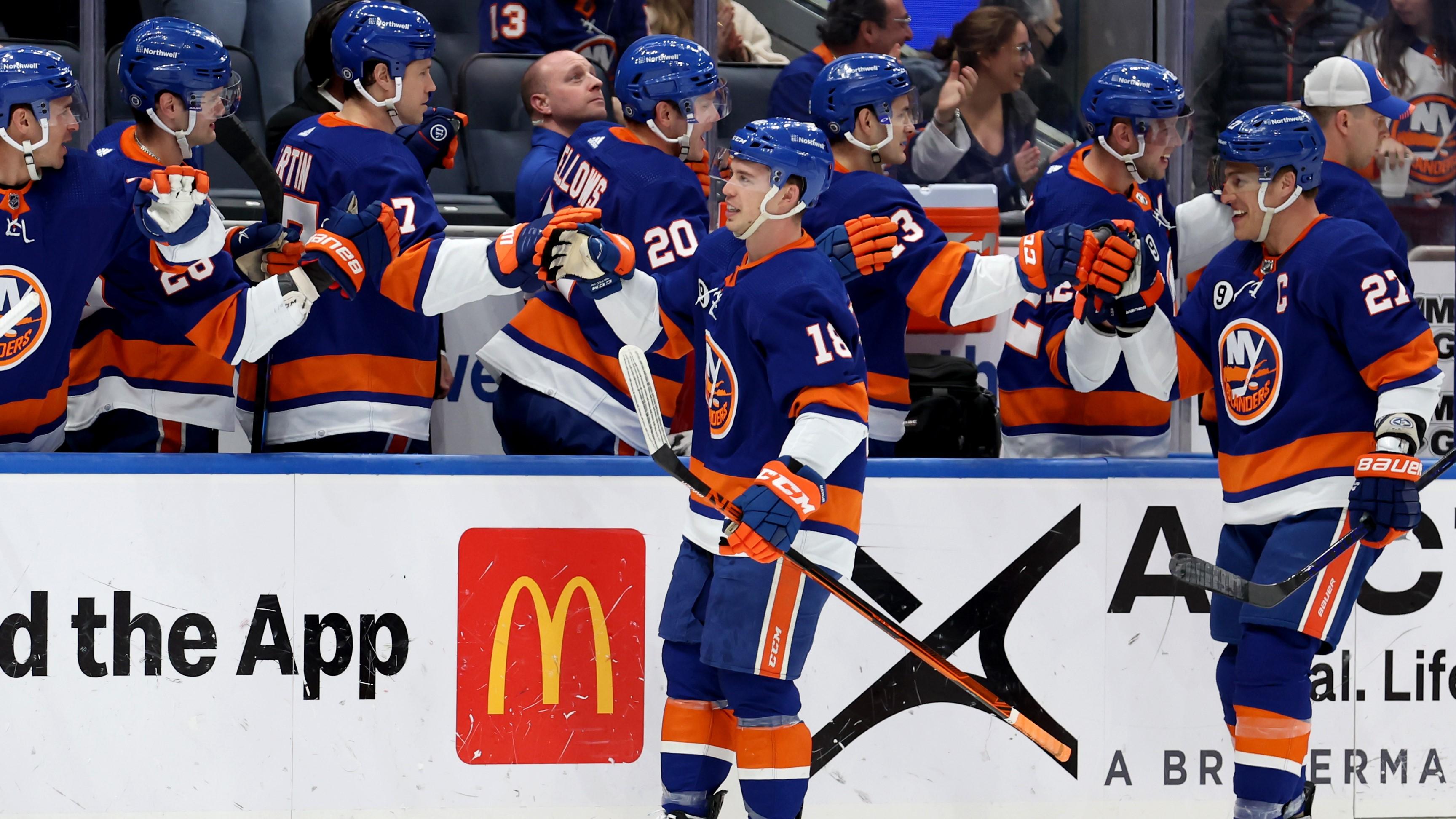 Mar 24, 2022; Elmont, New York, USA; New York Islanders left wing Anthony Beauvillier (18) celebrates his goal against the Detroit Red Wings with teammates during the first period at UBS Arena. / Brad Penner-USA TODAY Sports