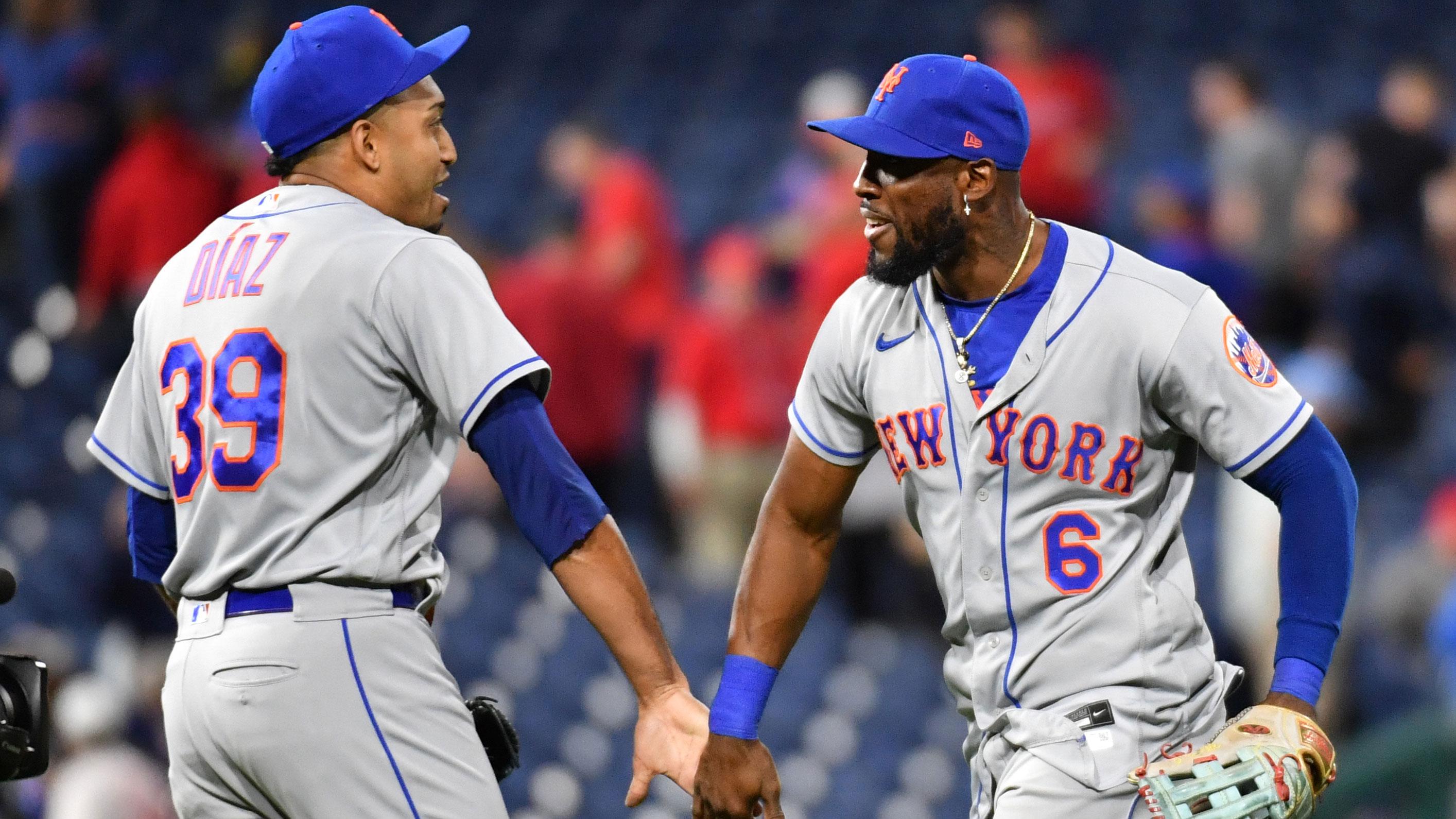 May 5, 2022; Philadelphia, Pennsylvania, USA; New York Mets relief pitcher Edwin Diaz (39) and right fielder Starling Marte (6) celebrate win against the Philadelphia Phillies at Citizens Bank Park. / Eric Hartline-USA TODAY Sports