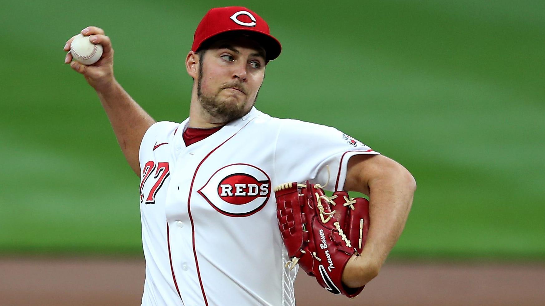 Sep 23, 2020; Cincinnati, Ohio, USA; Cincinnati Reds starting pitcher Trevor Bauer (27) throws against the Milwaukee Brewers during the first inning at Great American Ball Park. / David Kohl-USA TODAY Sports