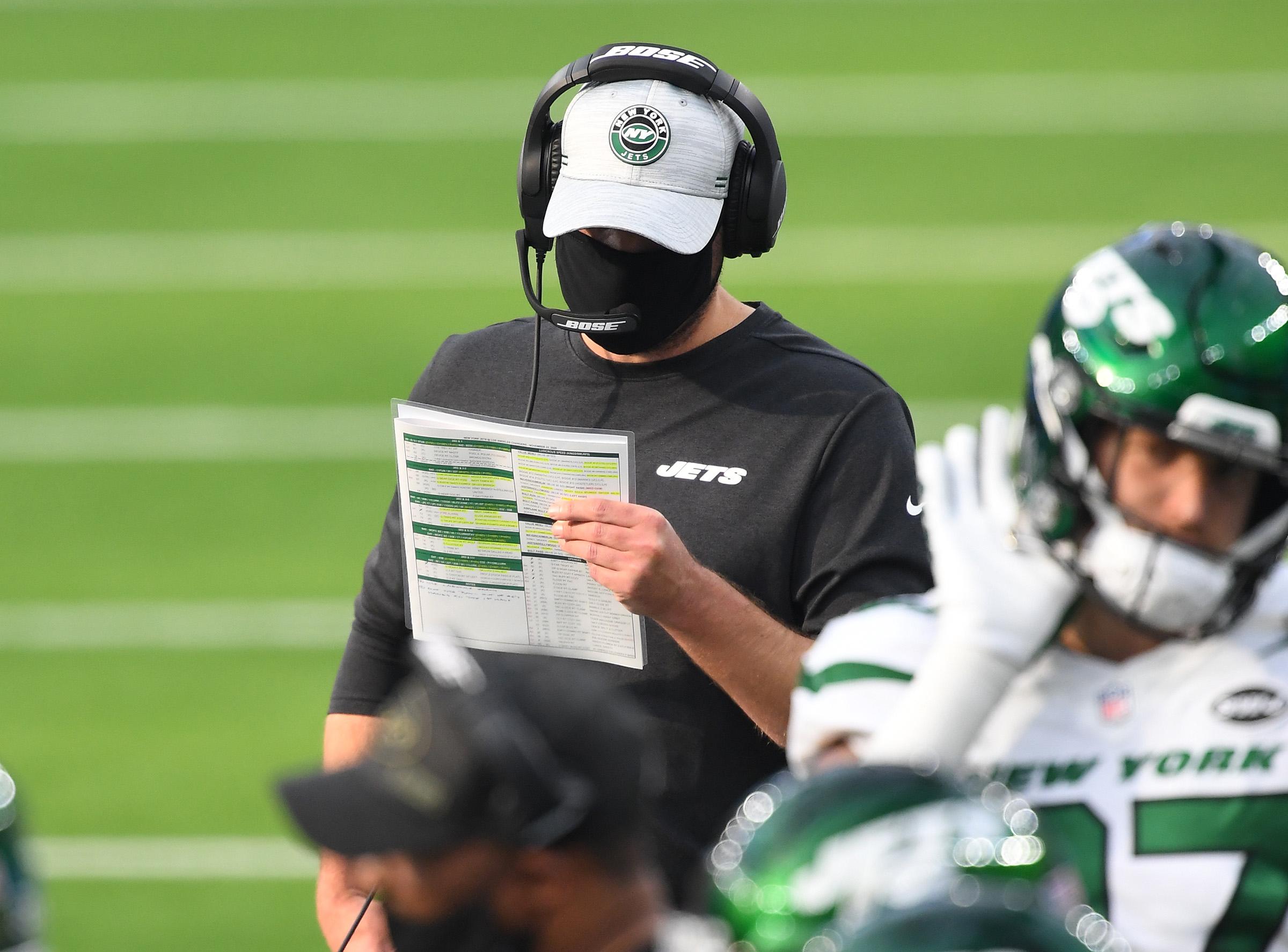 Nov 22, 2020; Inglewood, California, USA; New York Jets head coach Adam Gase looks at his play sheet on the sidelines in the first half against the Los Angeles Chargers at SoFi Stadium. Mandatory Credit: Jayne Kamin-Oncea-USA TODAY Sports / © Jayne Kamin-Oncea-USA TODAY Sports