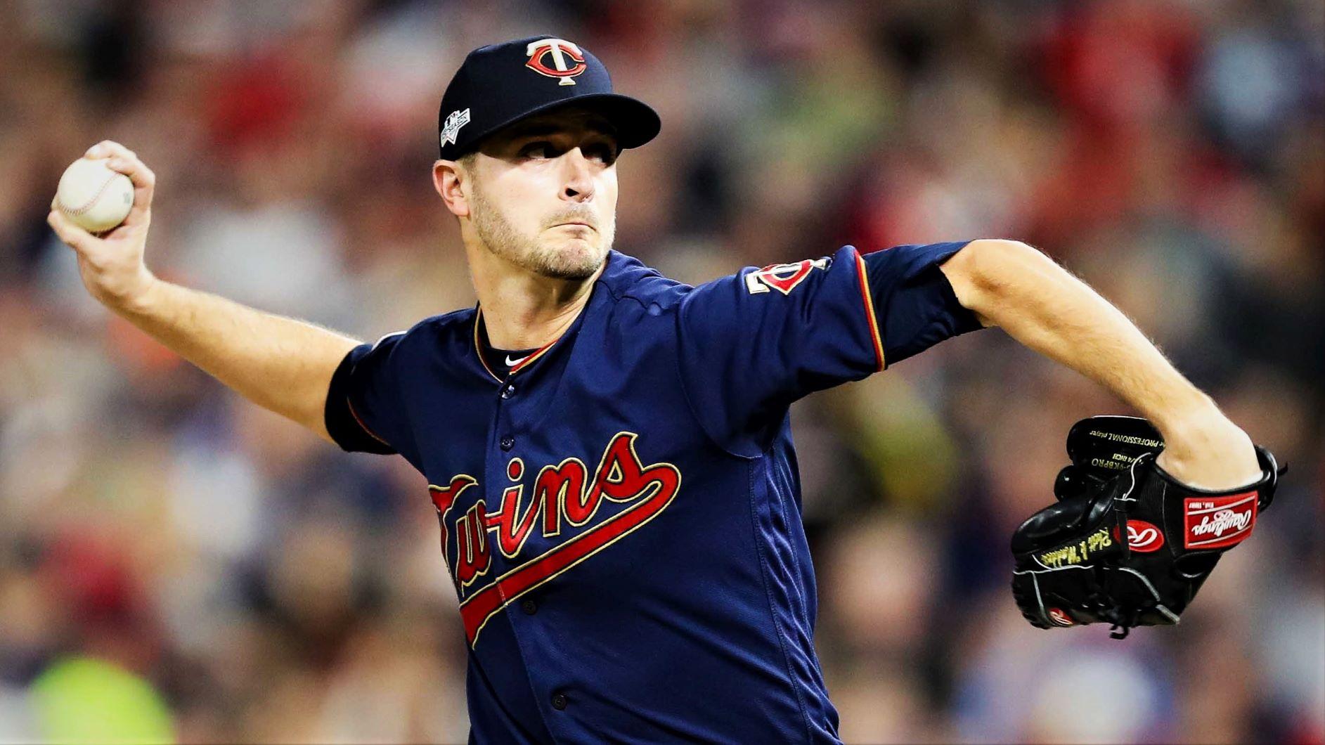 Oct 7, 2019; Minneapolis, MN, USA; Minnesota Twins starting pitcher Jake Odorizzi (12) delivers during the first inning of game three against the New York Yankees in the 2019 ALDS playoff baseball series at Target Field. Mandatory Credit: Jesse Johnson-USA TODAY Sports / © Jesse Johnson-USA TODAY Sports
