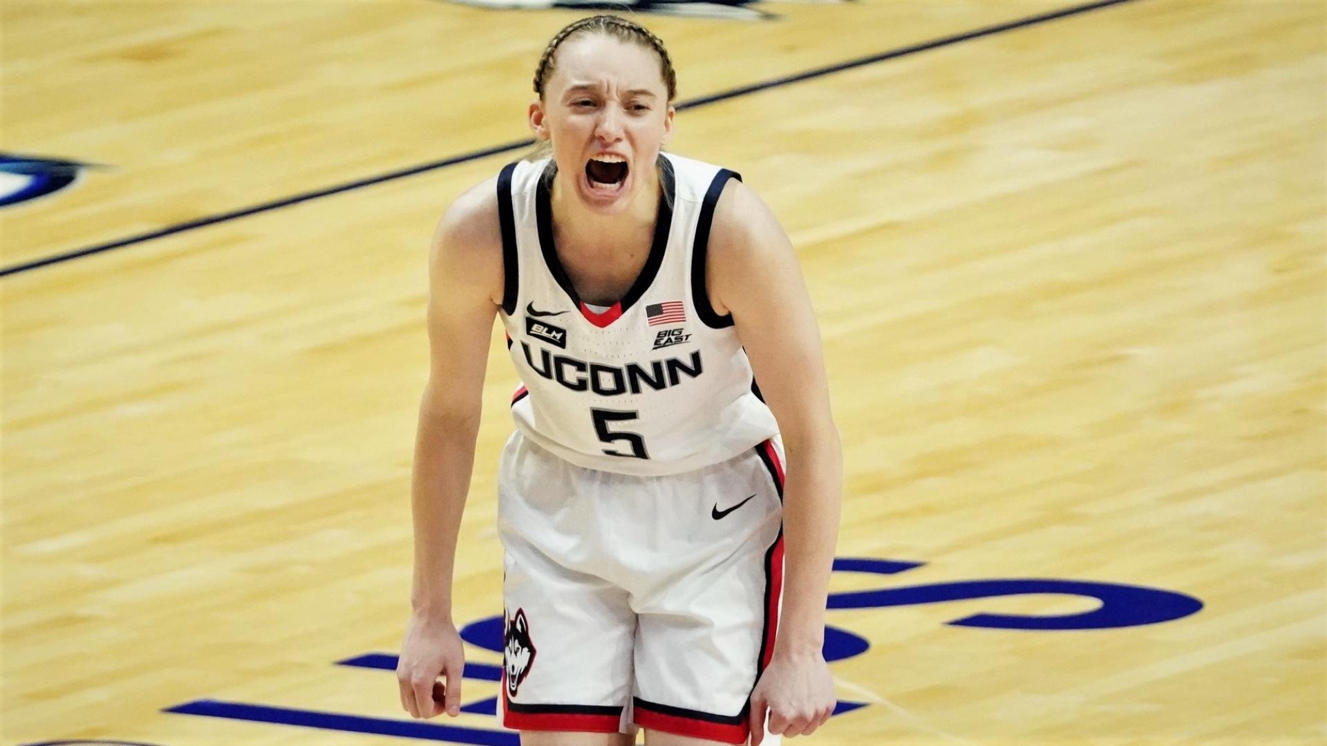 Mar 8, 2021; Uncasville, Connecticut, USA; UConn Huskies guard Paige Bueckers (5) reacts after a basket against the Marquette Golden Eagles in the first half at Mohegan Sun. / David Butler II-USA TODAY Sports