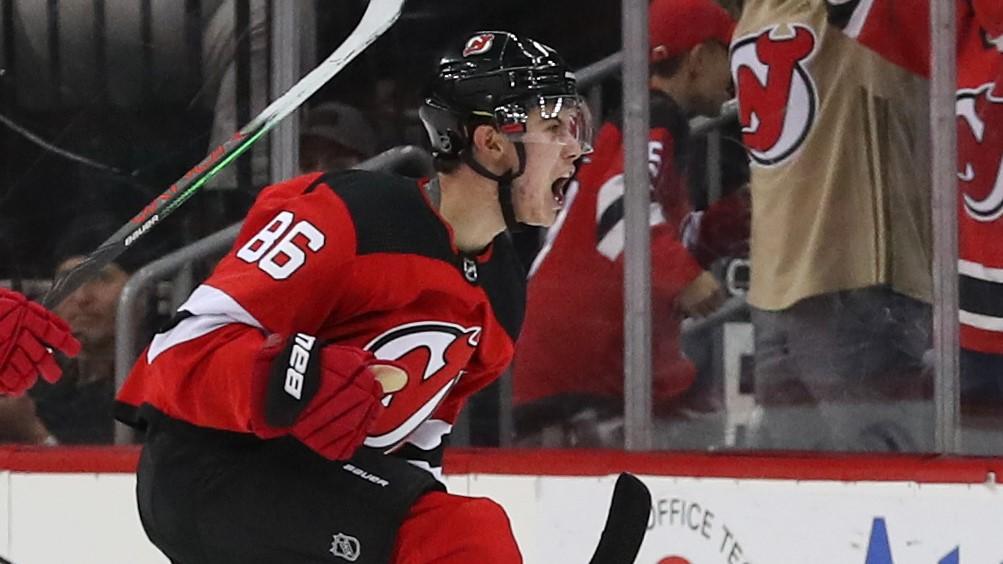 Oct 19, 2019; Newark, NJ, USA; New Jersey Devils center Jack Hughes (86) celebrates after scoring his first NHL goal during the first period of their game against the Vancouver Canucks at Prudential Center. Mandatory Credit: Ed Mulholland-USA TODAY Sports / Ed Mulholland-USA TODAY Sports
