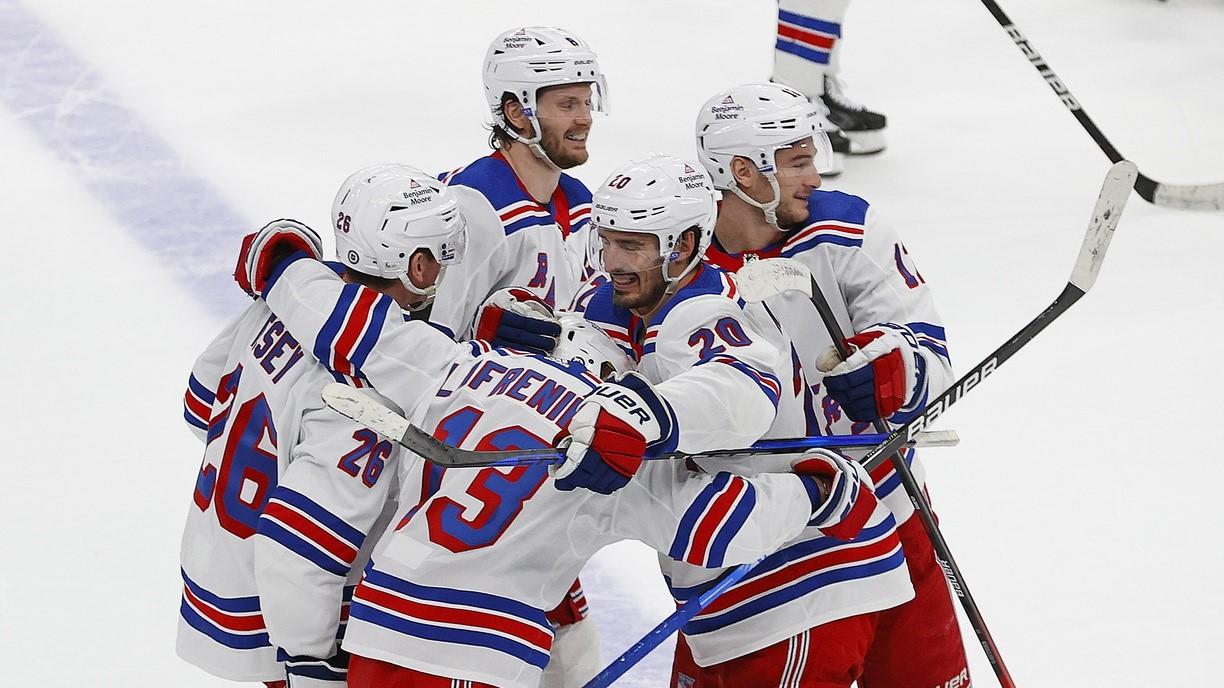 Feb 17, 2023; Edmonton, Alberta, CAN; The New York Rangers celebrate a shoot-out winning goal scored by forward Alexis Lafreniere (13) against the Edmonton Oilers at Rogers Place. / Perry Nelson-USA TODAY Sports