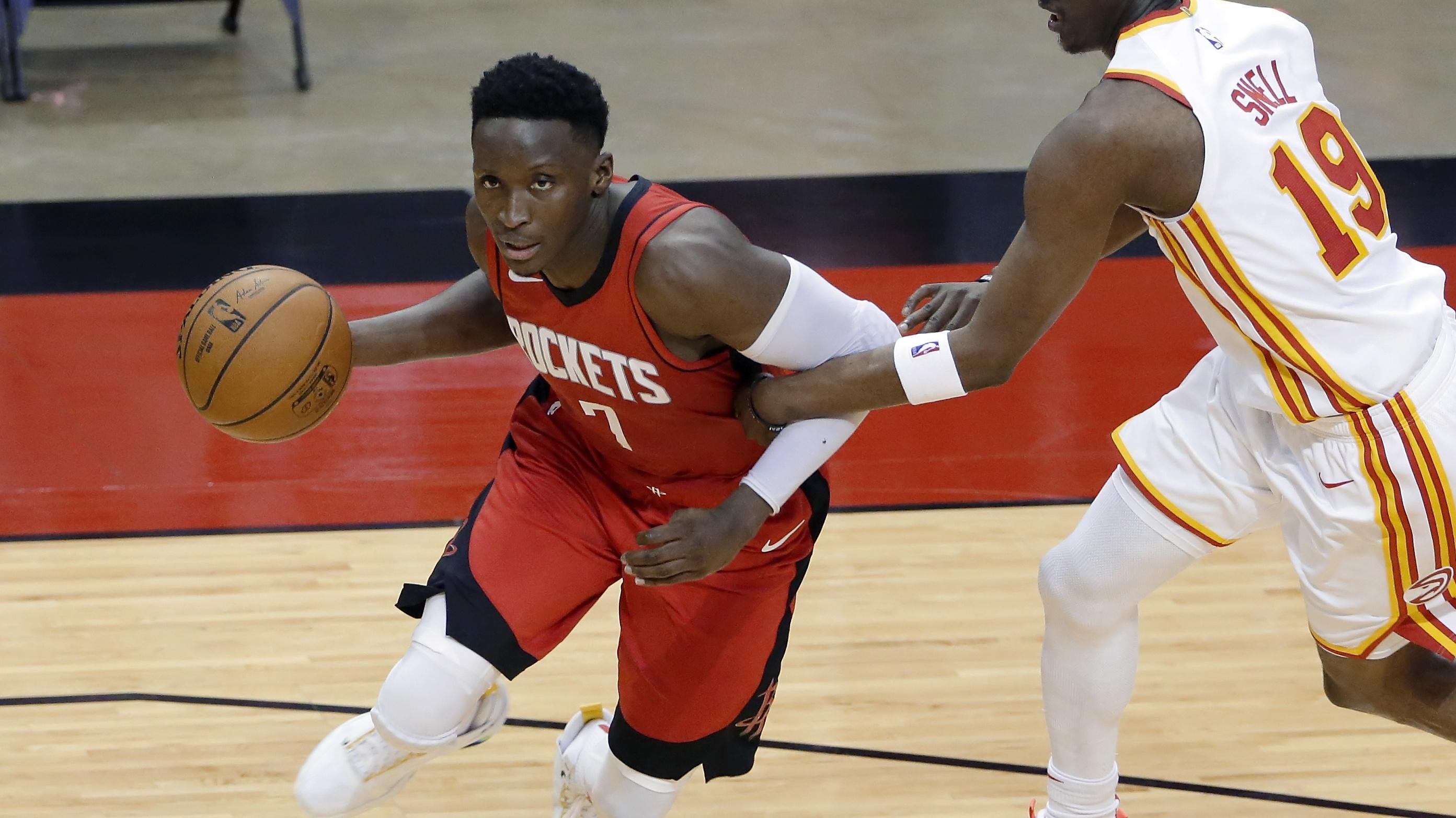 Mar 16, 2021; Houston, Texas, USA; Houston Rockets guard Victor Oladipo (7) is fouled as he drives around Atlanta Hawks guard Tony Snell (19) during the second half at Toyota Center. Mandatory Credit: Michael Wyke/POOL PHOTOS-USA TODAY Sports / © POOL PHOTOS-USA TODAY Sports