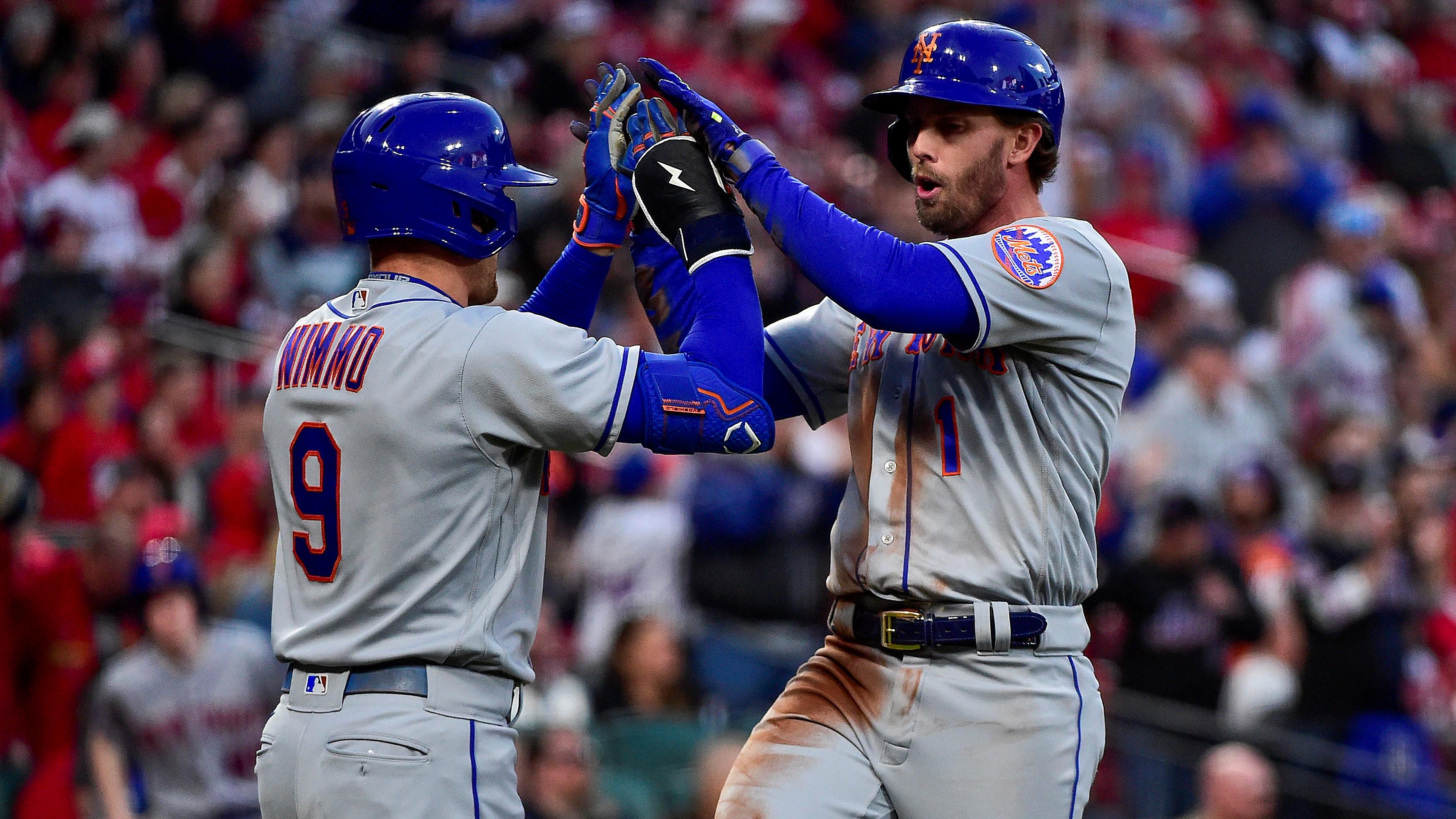 Apr 26, 2022; St. Louis, Missouri, USA; New York Mets second baseman Jeff McNeil (1) celebrates with center fielder Brandon Nimmo (9) after scoring against the St. Louis Cardinals during the third inning at Busch Stadium. / Jeff Curry-USA TODAY Sports