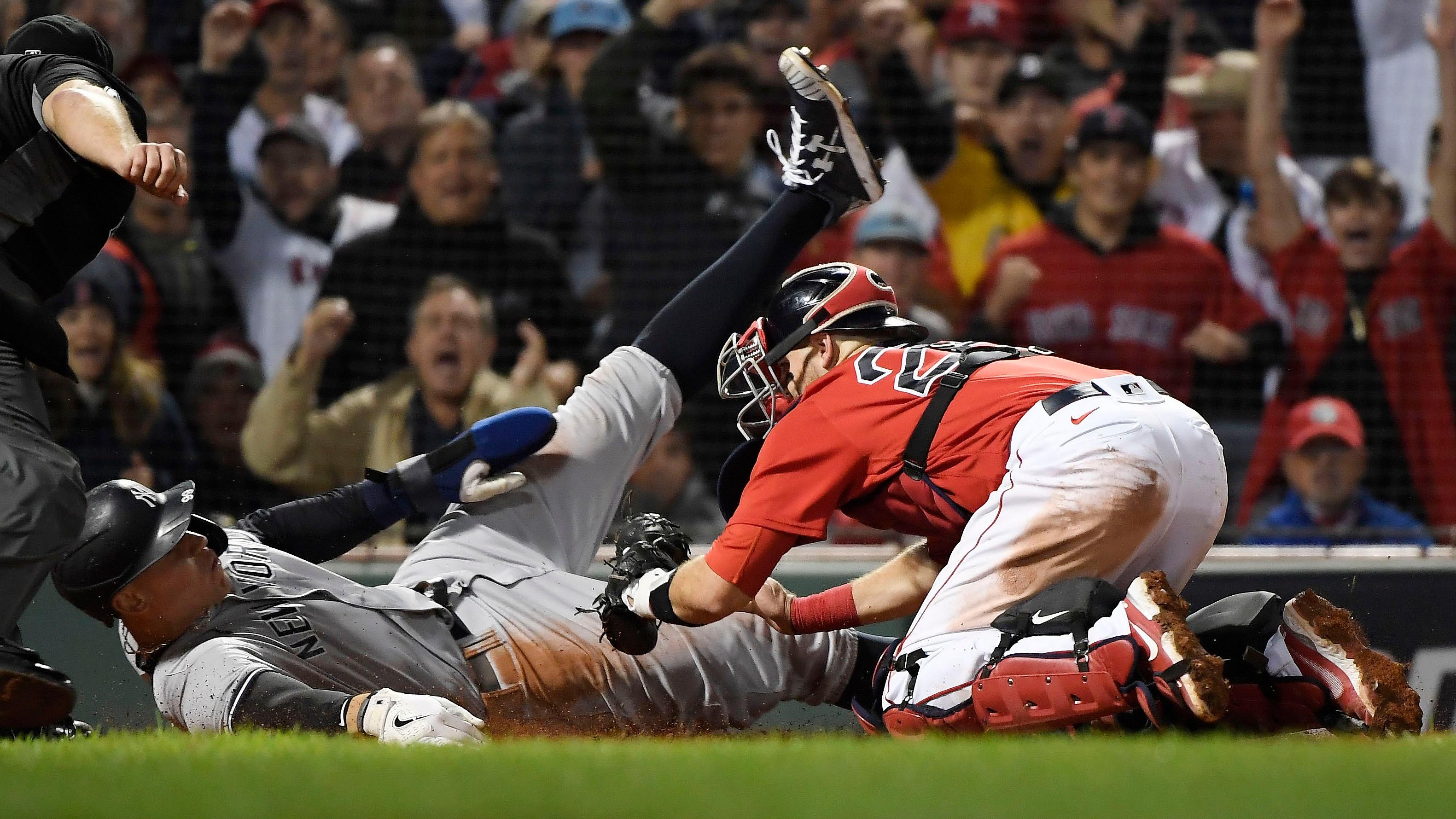 Oct 5, 2021; Boston, Massachusetts, USA; New York Yankees right fielder Aaron Judge (99) is out at home against Boston Red Sox catcher Kevin Plawecki (25) during the sixth inning of the American League Wildcard game at Fenway Park. / Bob DeChiara-USA TODAY Sports