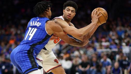 New York Knicks guard Quentin Grimes (6) looks to pass the bal after against Orlando Magic guard Gary Harris (14) in the second quarter at Amway Center / Nathan Ray Seebeck - USA TODAY Sports