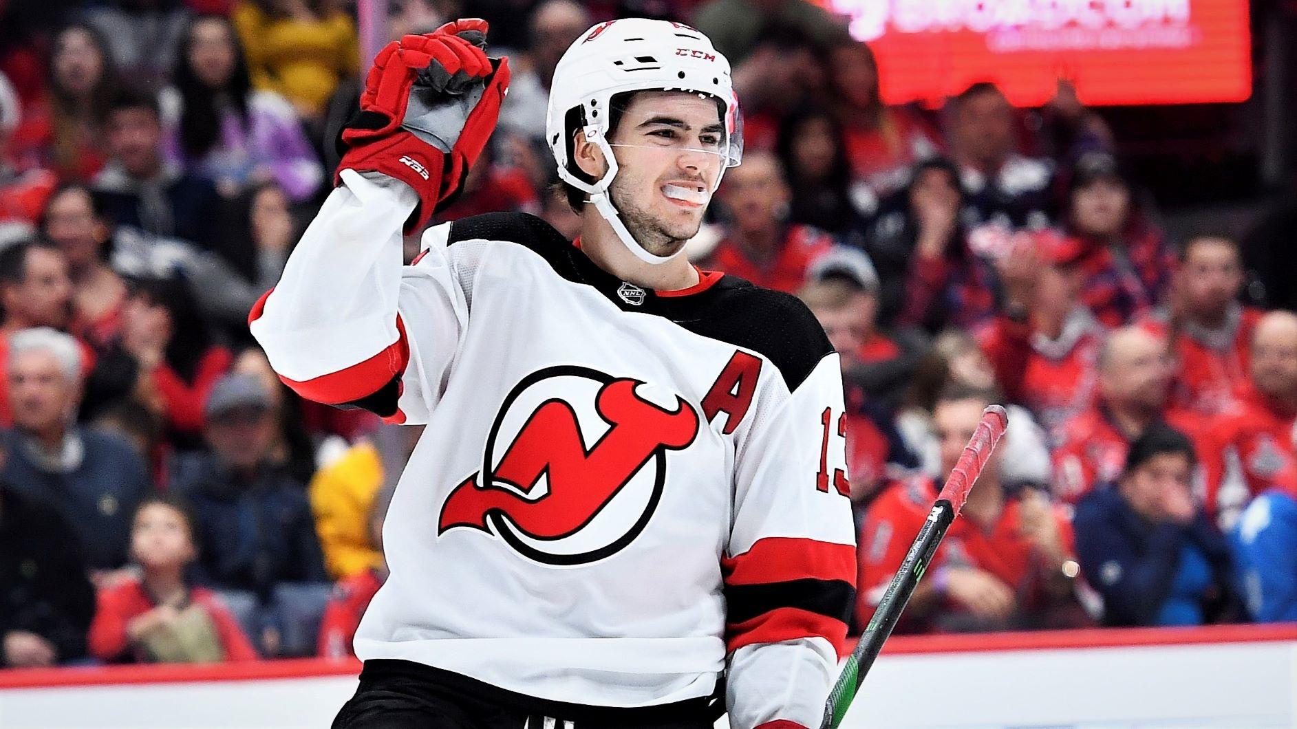 Jan 11, 2020; Washington, District of Columbia, USA; New Jersey Devils center Nico Hischier (13) reacts after scoring a goal against the Washington Capitals during the second period at Capital One Arena. Mandatory Credit: Brad Mills-USA TODAY Sports / © Brad Mills-USA TODAY Sports