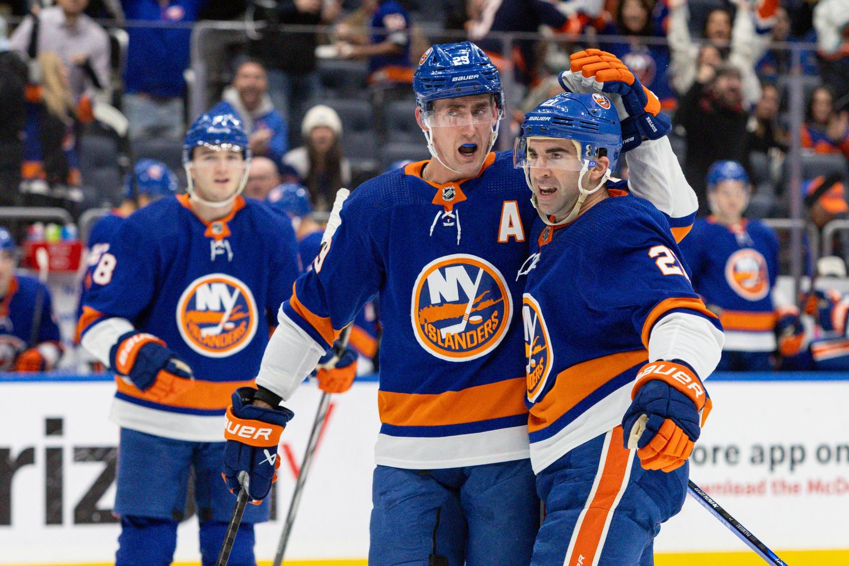 New York Islanders center Kyle Palmieri (21) celebrates his goal with New York Islanders center Brock Nelson (29) against the Toronto Maple Leafs during the second period at UBS Arena. / Thomas Salus-USA TODAY Sports