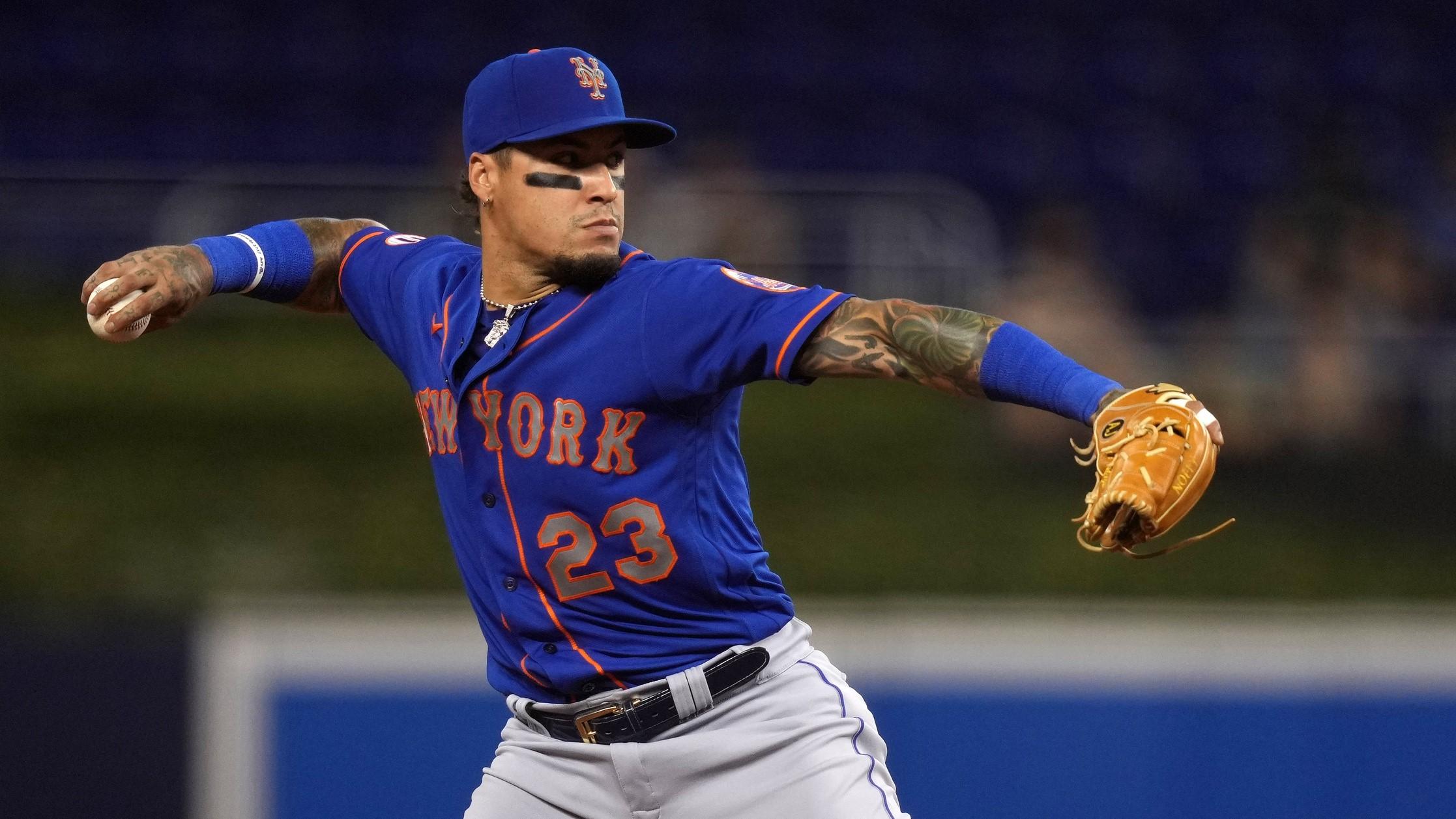 New York Mets shortstop Javier Baez (23) throws out Miami Marlins left fielder Jorge Alfaro (not pictured) in the 2nd inning at loanDepot park. / Jasen Vinlove-USA TODAY Sports