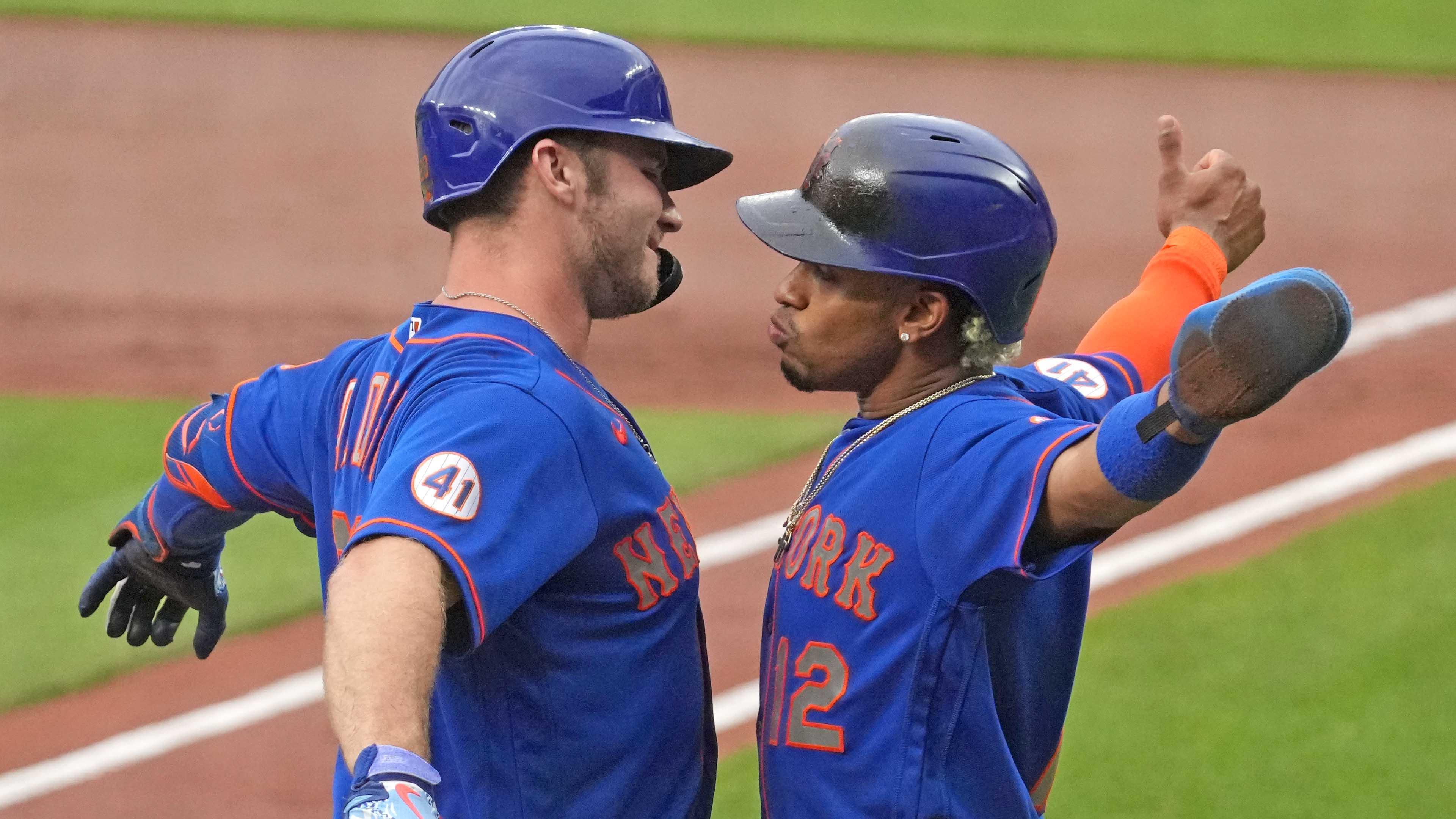 Jun 9, 2021; Baltimore, Maryland, USA; New York Mets first baseman Pete Alonso (20) is greeted by shortstop Francisco Lindor (12) who scored on his two run home run in the first inning against the Baltimore Orioles at Oriole Park at Camden Yards. / Mitch Stringer-USA TODAY Sports