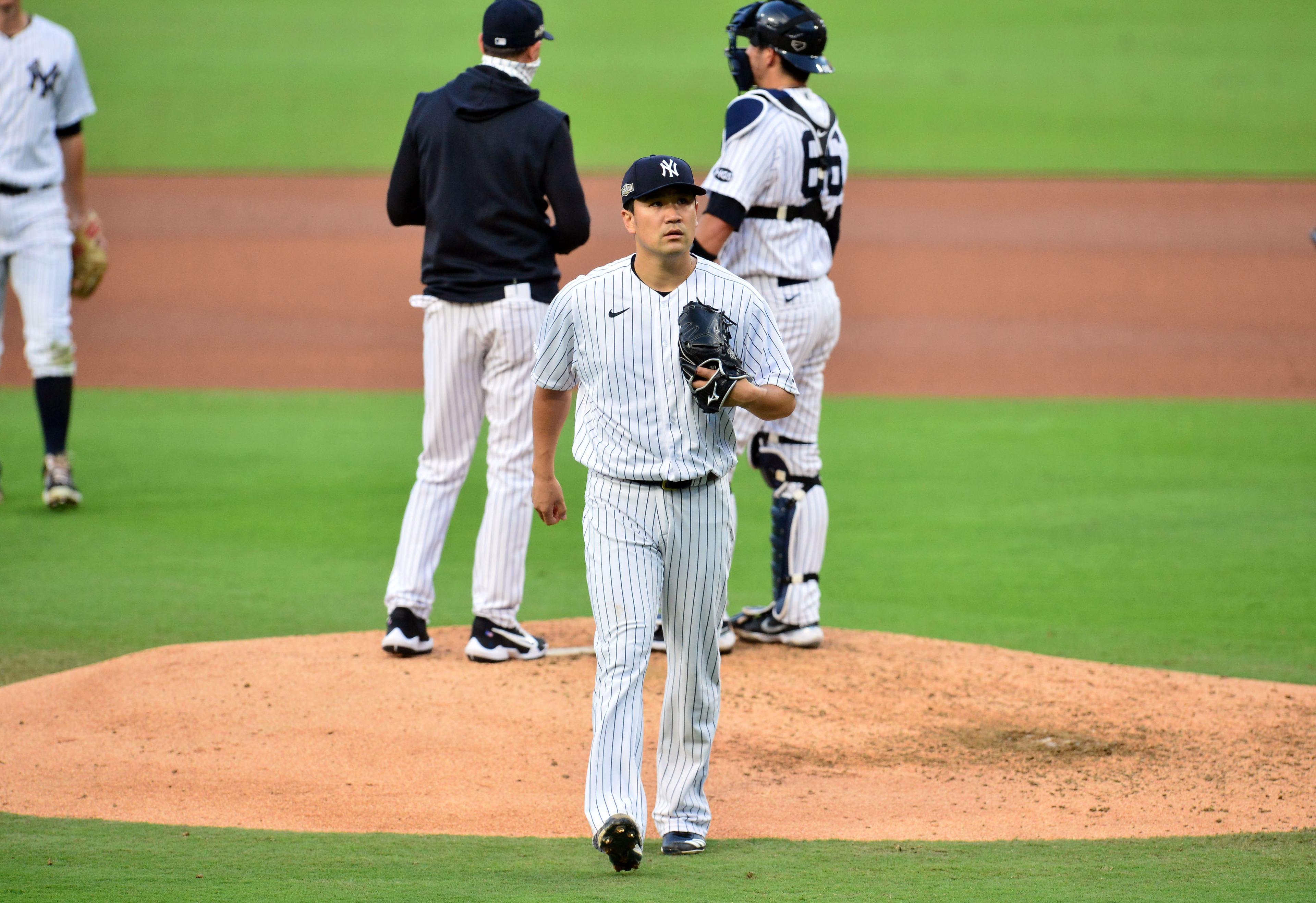 New York Yankees starting pitcher Masahiro Tanaka (19) is relieved in the fifth inning against the Tampa Bay Rays during game three of the 2020 ALDS at Petco Park. / Gary A. Vasquez - USA Today Sports