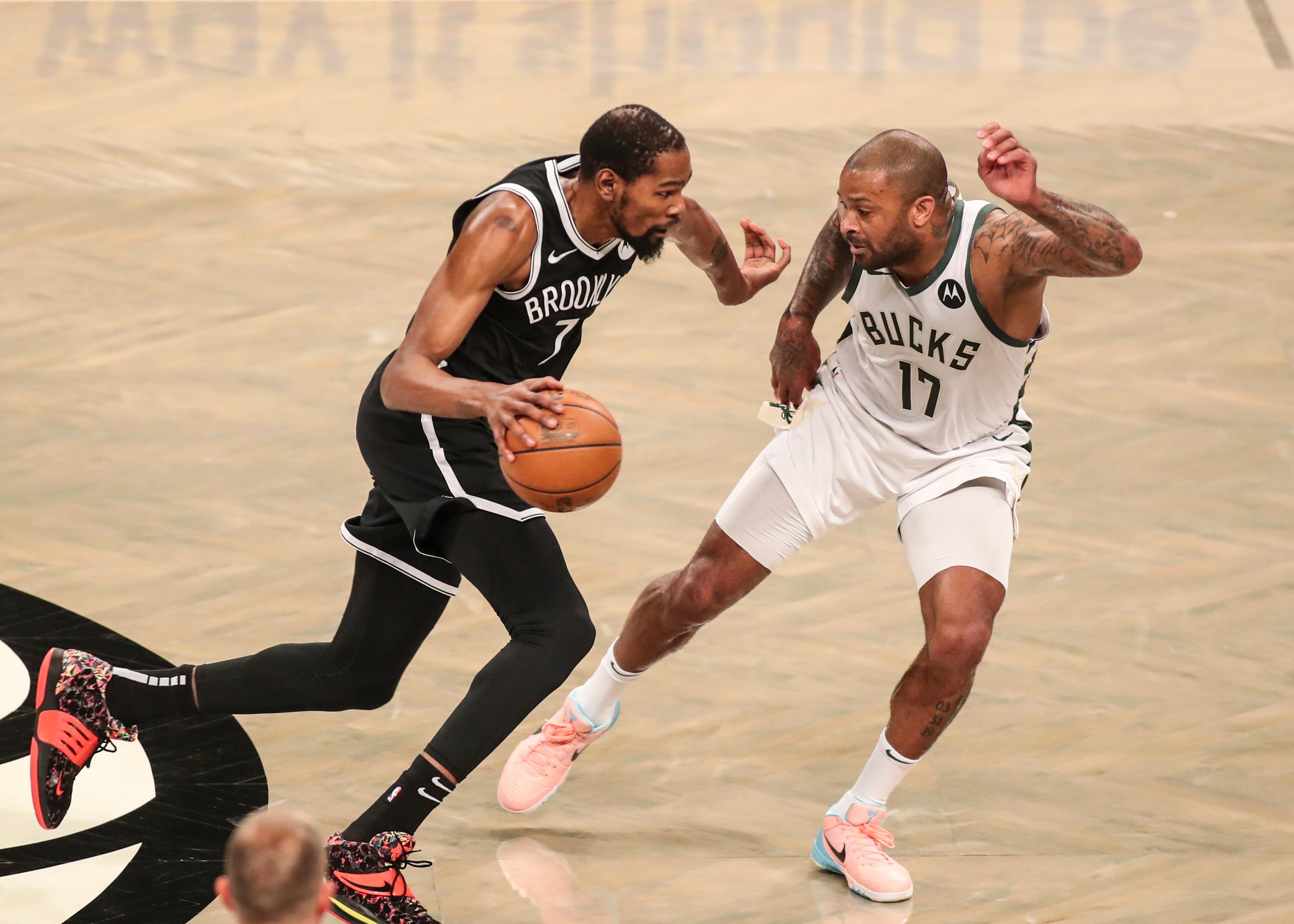 Jun 19, 2021; Brooklyn, New York, USA Brooklyn Nets forward Kevin Durant (7) controls the ball against Milwaukee Bucks forward P.J. Tucker (17) in the first quarter during game seven in the second round of the 2021 NBA Playoffs at Barclays Center. Mandatory Credit: Wendell Cruz-USA TODAY Sports / Wendell Cruz-USA TODAY Sports