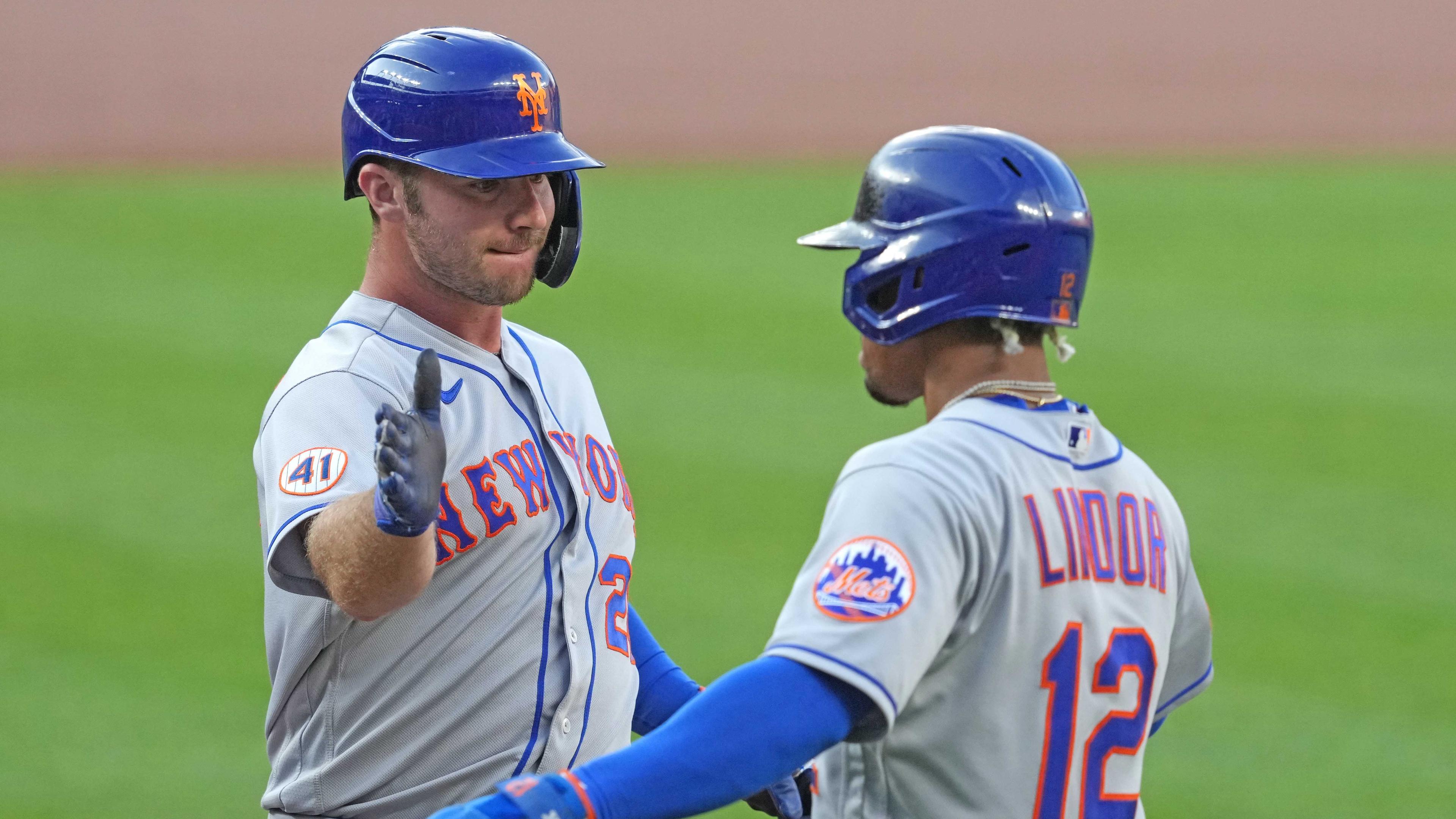 Jun 8, 2021; Baltimore, Maryland, USA; New York Mets designated hitter Pete Alonso (20) is greeted by shortstop Francisco Lindor (12) after a two-run home run in the first inning against the Baltimore Orioles at Oriole Park at Camden Yards. / Mitch Stringer-USA TODAY Sports