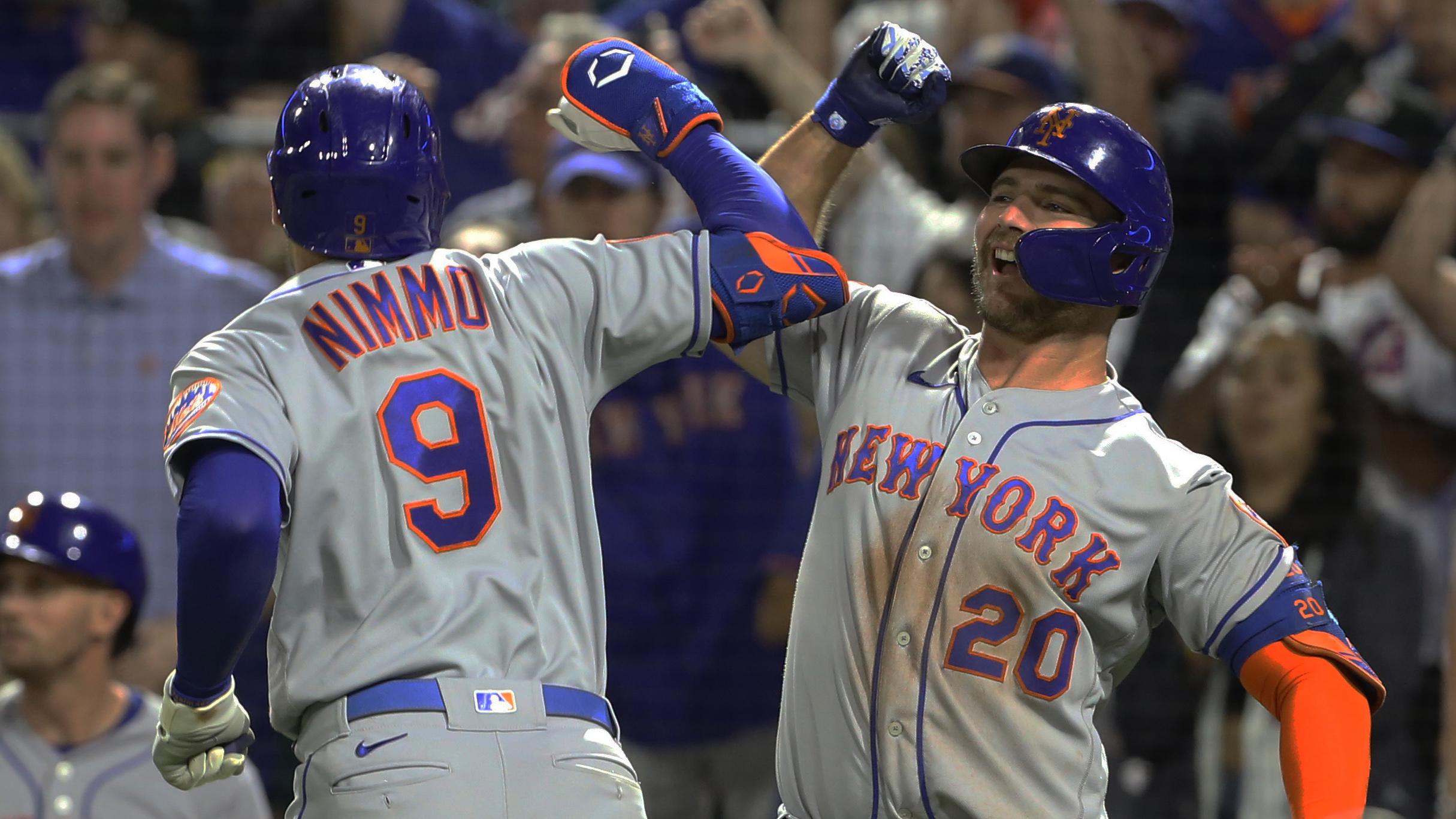 Jul 17, 2021; Pittsburgh, Pennsylvania, USA; New York Mets center fielder Brandon Nimmo (9) celebrates with first baseman Pete Alonso (20) after hitting a solo home run against the Pittsburgh Pirates during the ninth inning at PNC Park. / Charles LeClaire-USA TODAY Sports