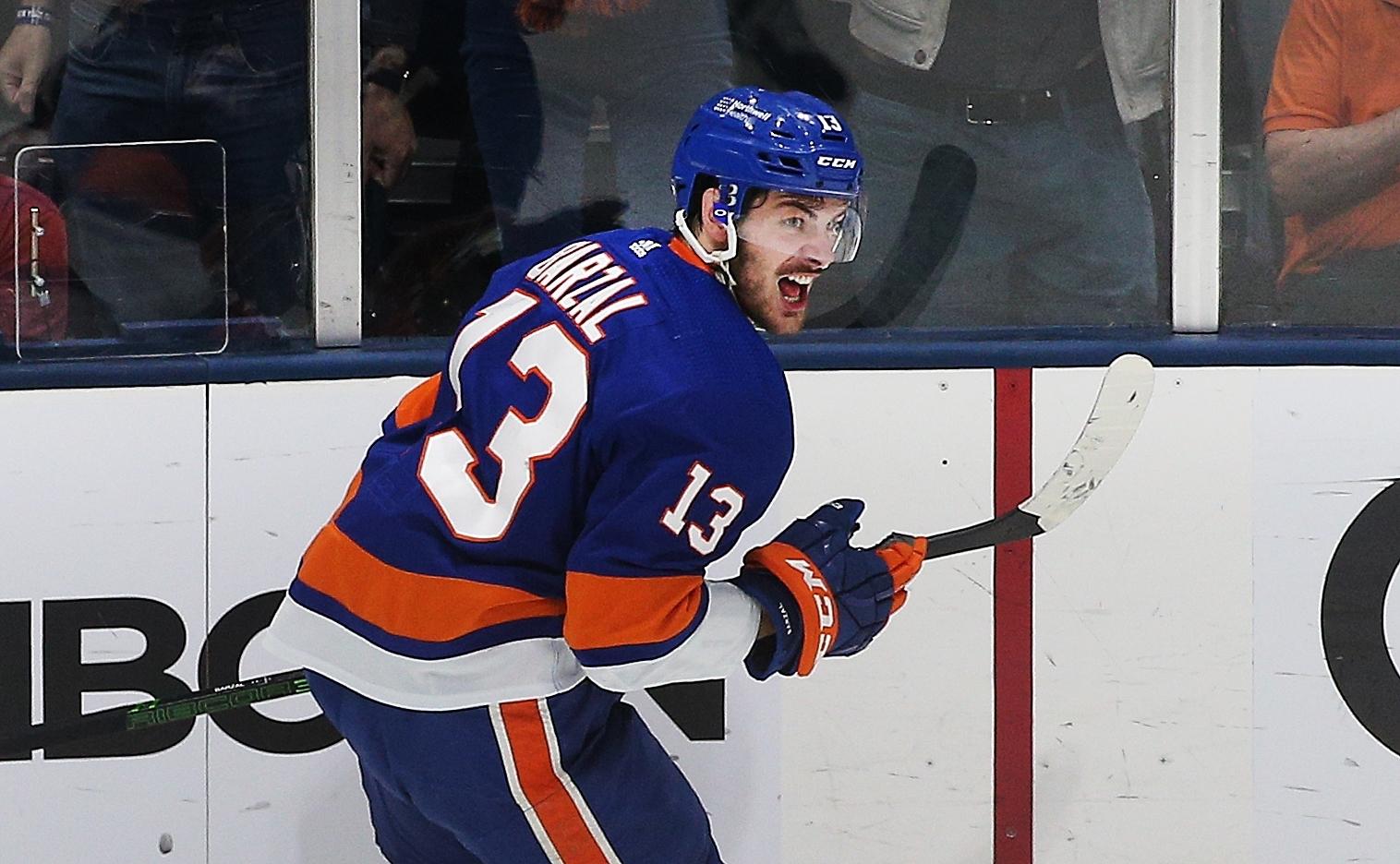 Jun 19, 2021; Uniondale, New York, USA; New York Islanders center Mathew Barzal (13) reacts after scoring a goal against the Tampa Bay Lightning during the second period of game four of the 2021 Stanley Cup Semifinals at Nassau Veterans Memorial Coliseum. Mandatory Credit: Andy Marlin-USA TODAY Sports / Andy Marlin-USA TODAY Sports