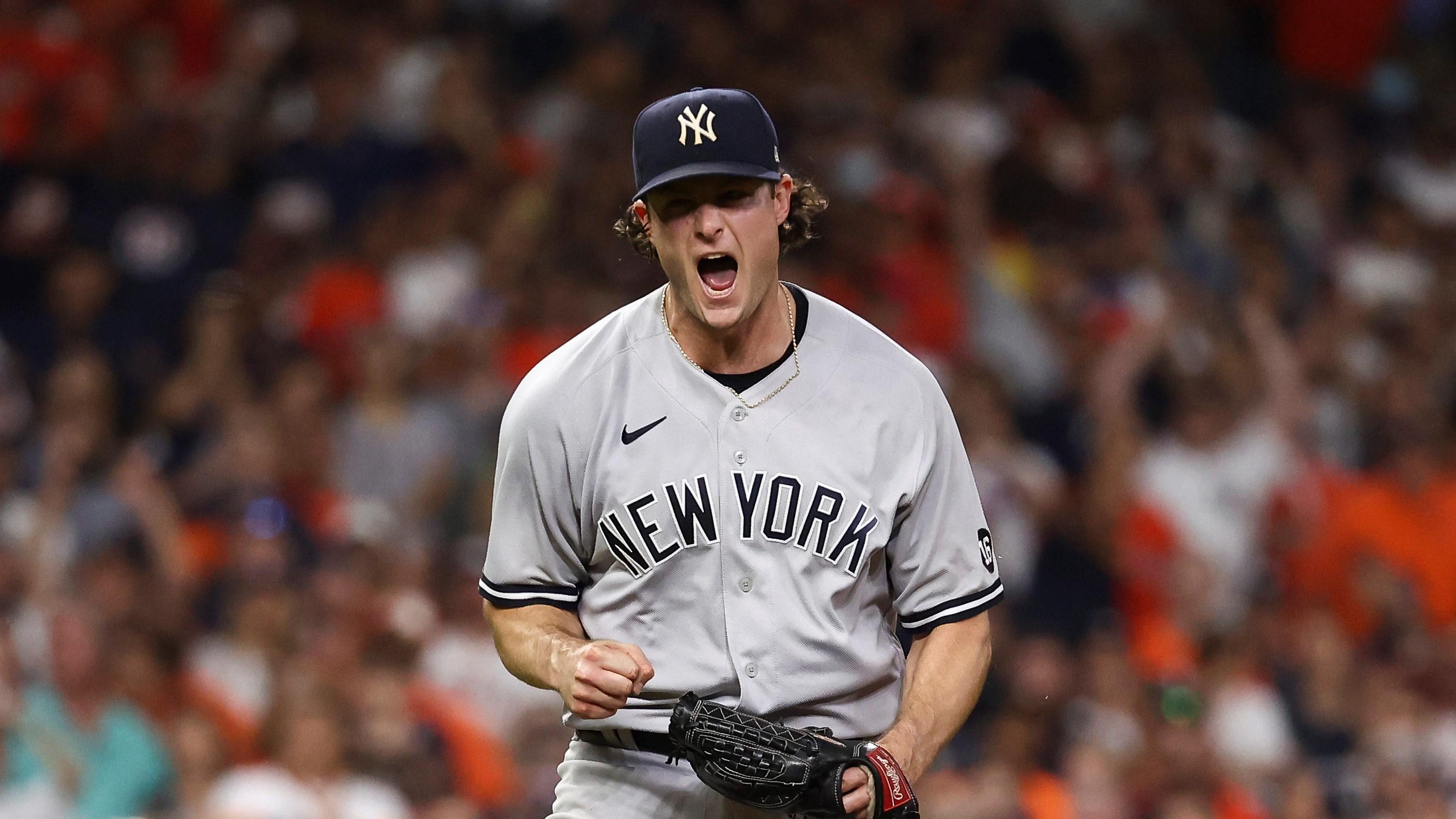 Jul 10, 2021; Houston, Texas, USA; New York Yankees starting pitcher Gerrit Cole (45) reacts after recording a strikeout against the Houston Astros to end the game at Minute Maid Park. Mandatory Credit: Troy Taormina-USA TODAY Sports / Troy Taormina-USA TODAY Sports