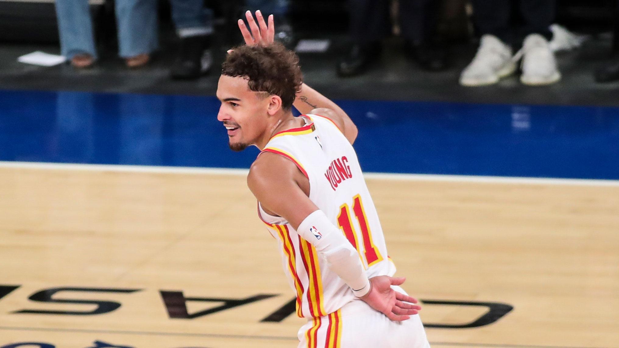 Jun 2, 2021; New York, New York, USA; Atlanta Hawks guard Trae Young (11) waves to the crowd after making a three point shot in against the New York Knicks in the fourth quarter during game five in the first round of the 2021 NBA Playoffs at Madison Square Garden. / Wendell Cruz-USA TODAY Sports