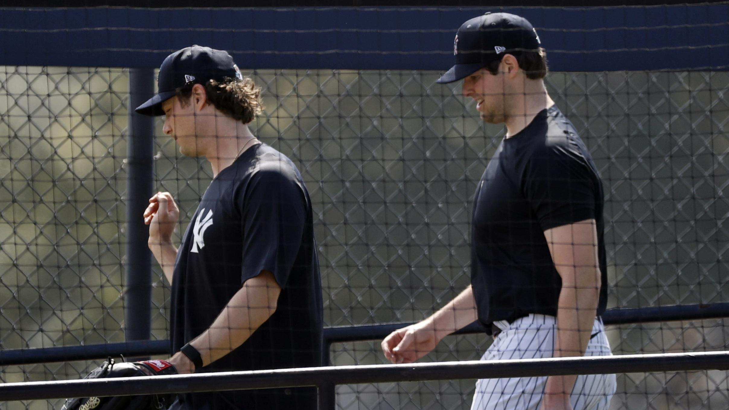 Feb 18, 2021; Tampa, Florida, USA; New York Yankees starting pitcher Gerrit Cole (45) and New York Yankees starting pitcher Jordan Montgomery (47) during the first day of spring training workouts at the Player Development Complex. Mandatory Credit: Kim Klement-USA TODAY Sports / © Kim Klement-USA TODAY Sports