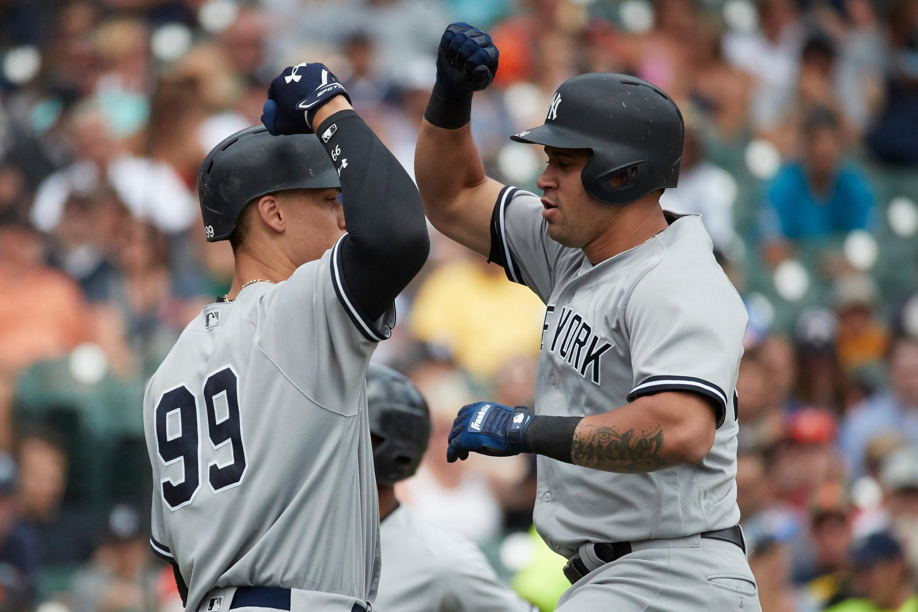 Aug 24, 2017; Detroit, MI, USA; New York Yankees designated hitter Gary Sanchez (24) receives congratulations from right fielder Aaron Judge (99) after he hit a home run in the fourth inning against the Detroit Tigers at Comerica Park. Mandatory Credit: Rick Osentoski-USA TODAY Sports / Rick Osentoski-USA TODAY Sports