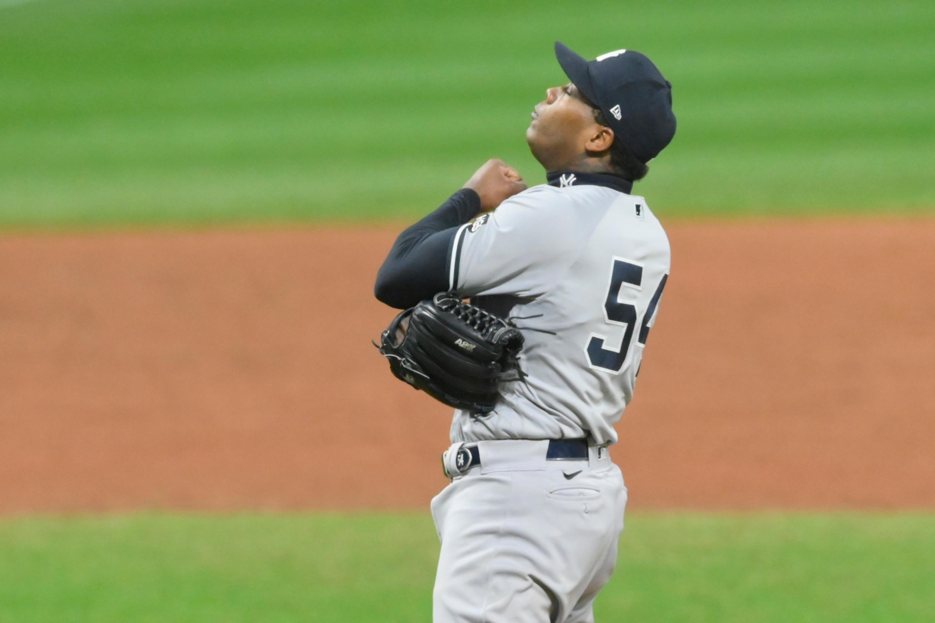 Sep 30, 2020; Cleveland, Ohio, USA; New York Yankees relief pitcher Aroldis Chapman (54) celebrates the final out in a win over the Cleveland Indians at Progressive Field. Mandatory Credit: David Richard-USA TODAY Sports / © David Richard-USA TODAY Sports