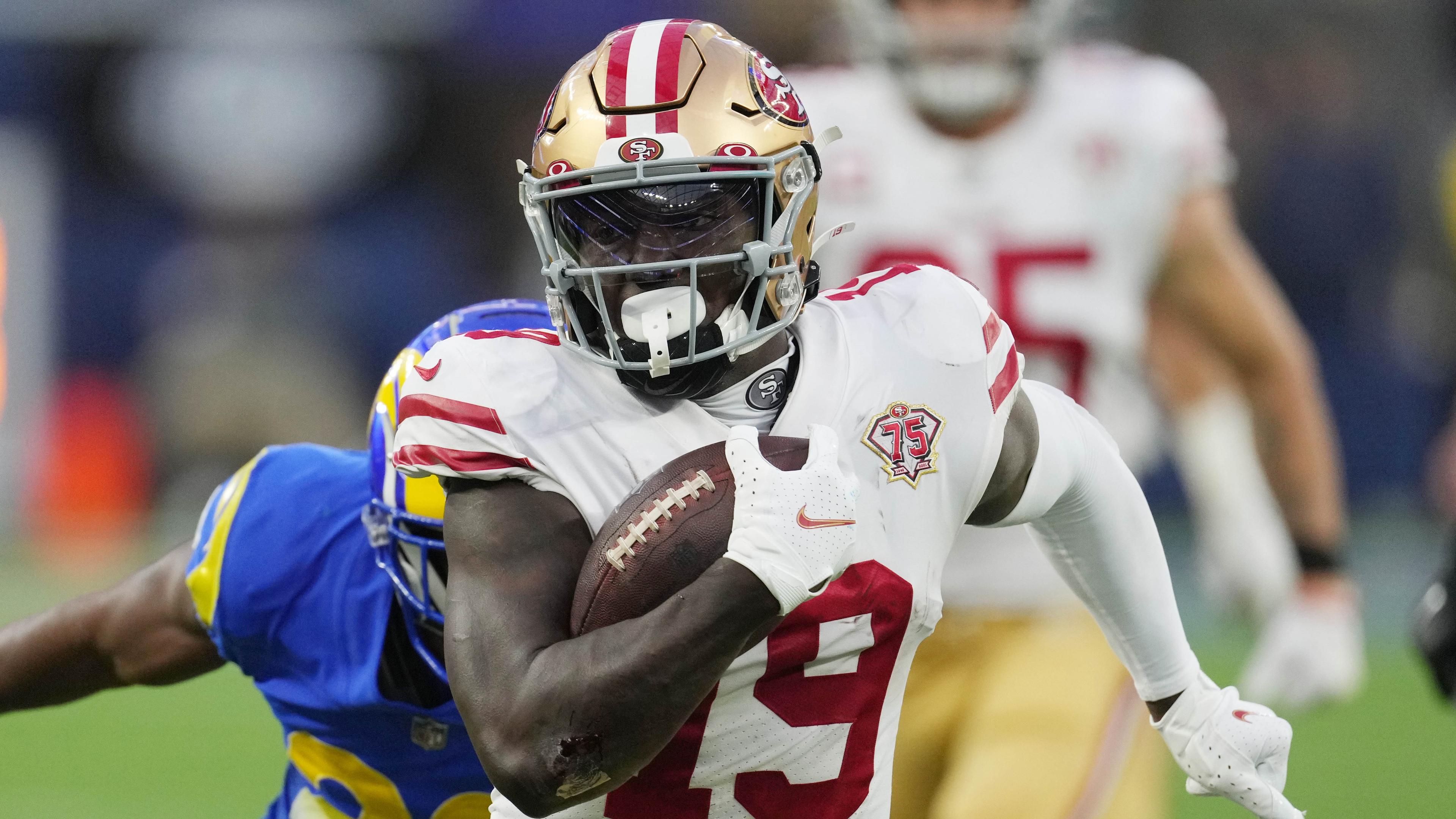 San Francisco 49ers wide receiver Deebo Samuel (19) runs after a catch against the Los Angeles Rams in the first half during the NFC Championship Game at SoFi Stadium. / Kirby Lee-USA TODAY Sports