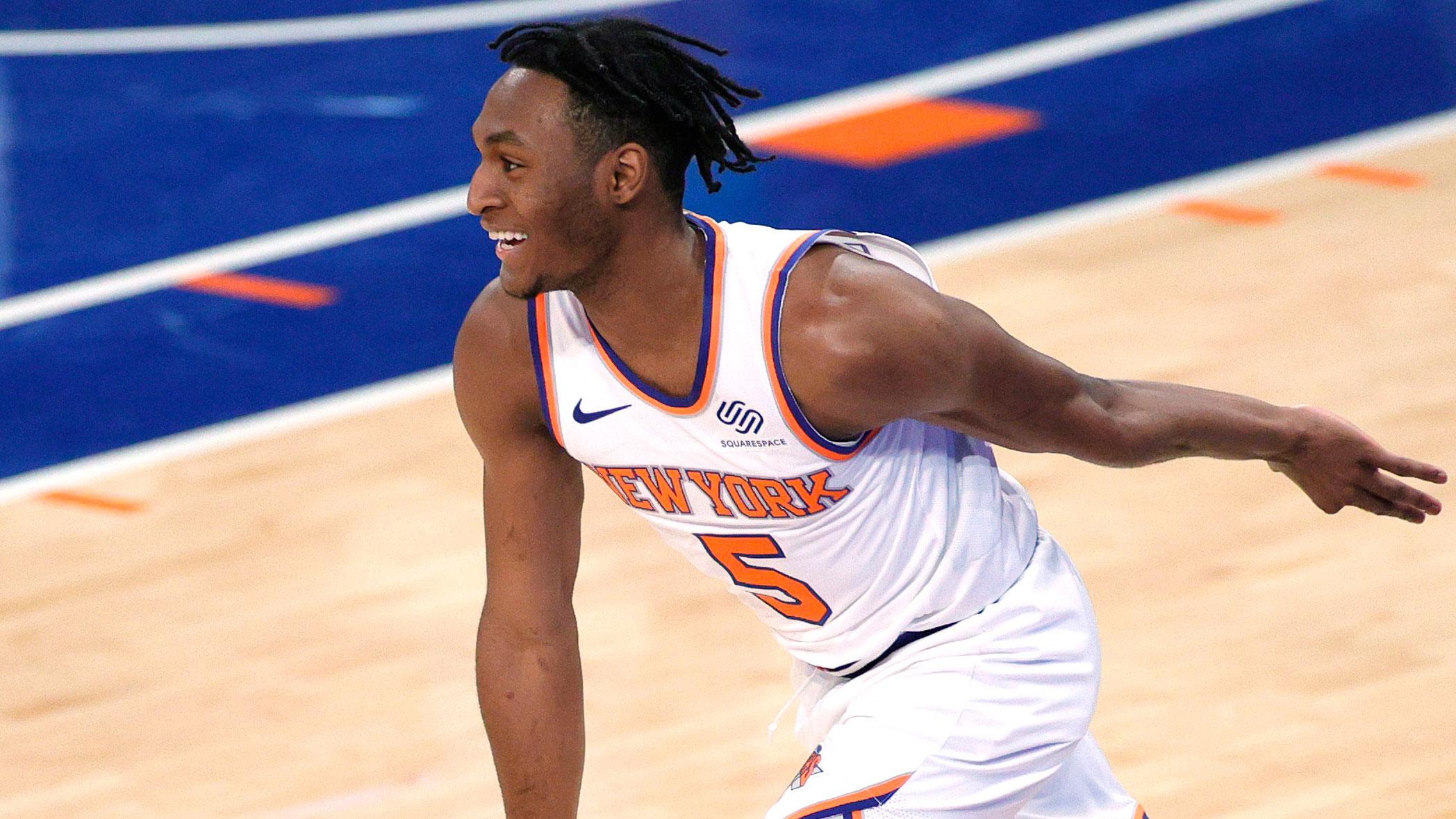 Apr 20, 2021; New York, New York, USA; Immanuel Quickley #5 of the New York Knicks reacts after making a three-point basket during the first half against the Charlotte Hornets at Madison Square Garden. / Sarah Stier/POOL PHOTOS-USA TODAY Sports