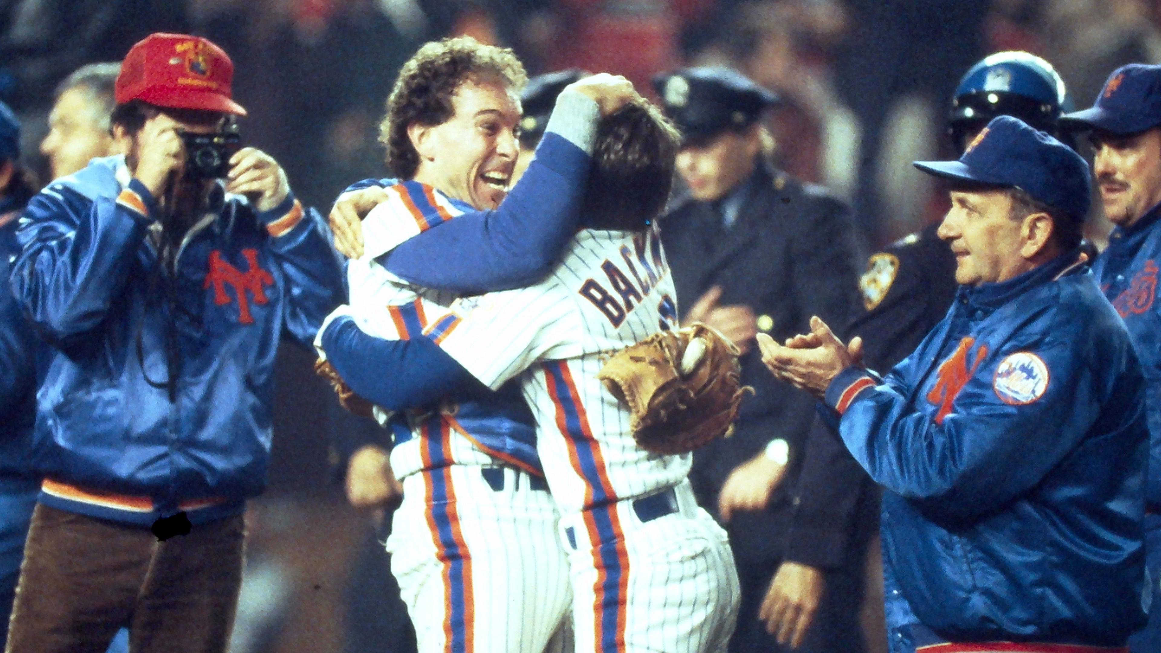 Mets Gary Carter jumps into the arms of Wally Backman after the Mets defeated the Boston Red Sox in Game 7 to win the World Series at Shea Stadium Oct. 27, 1986 / Frank Becerra Jr/USA TODAY / USA TODAY NETWORK