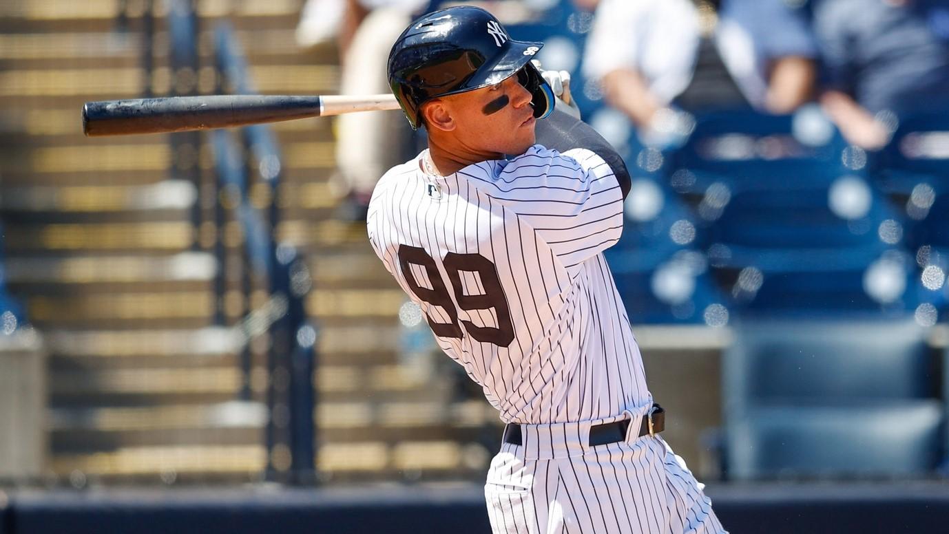 Mar 27, 2022; Tampa, Florida, USA; New York Yankees right fielder Aaron Judge (99) hits a two run home run in the fifth inning against the Pittsburgh Pirates during spring training at George M. Steinbrenner Field. / Nathan Ray Seebeck-USA TODAY Sports
