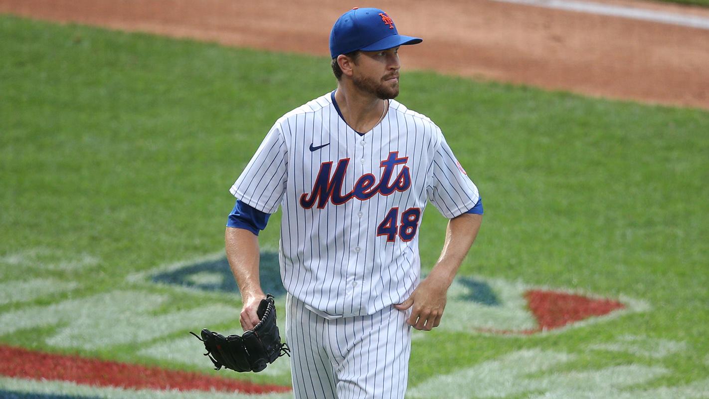 Jul 24, 2020; New York City, New York, USA; New York Mets starting pitcher Jacob deGrom (48) walks off the field during the fifth inning of an opening day game against the Atlanta Braves at Citi Field. The fifth would be his last inning. / Brad Penner-USA TODAY Sports