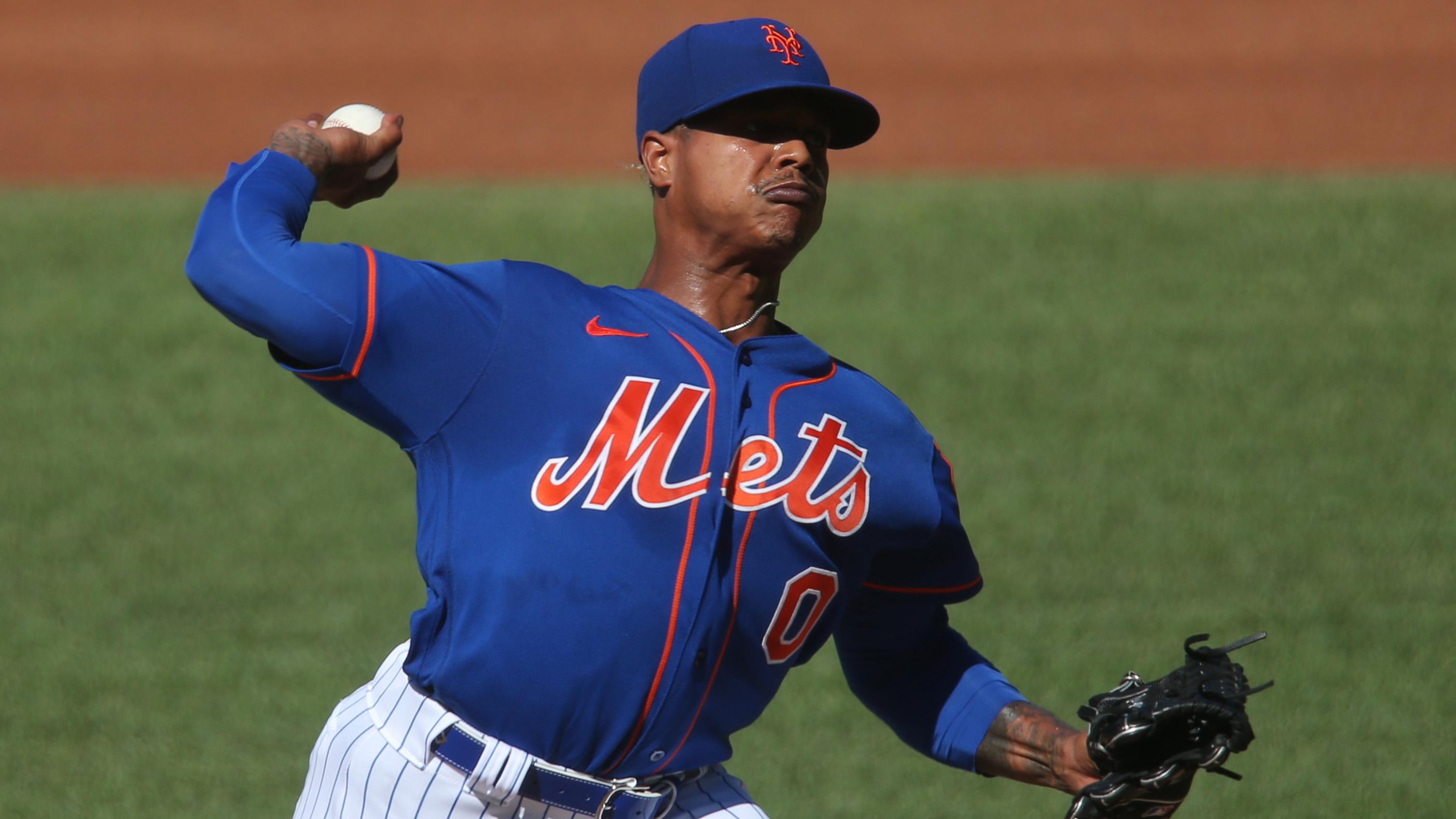 New York Mets starting pitcher Marcus Stroman (0) pitches during a simulated game during summer camp workouts at Citi Field. / Mandatory Credit: Brad Penner-USA TODAY Sports