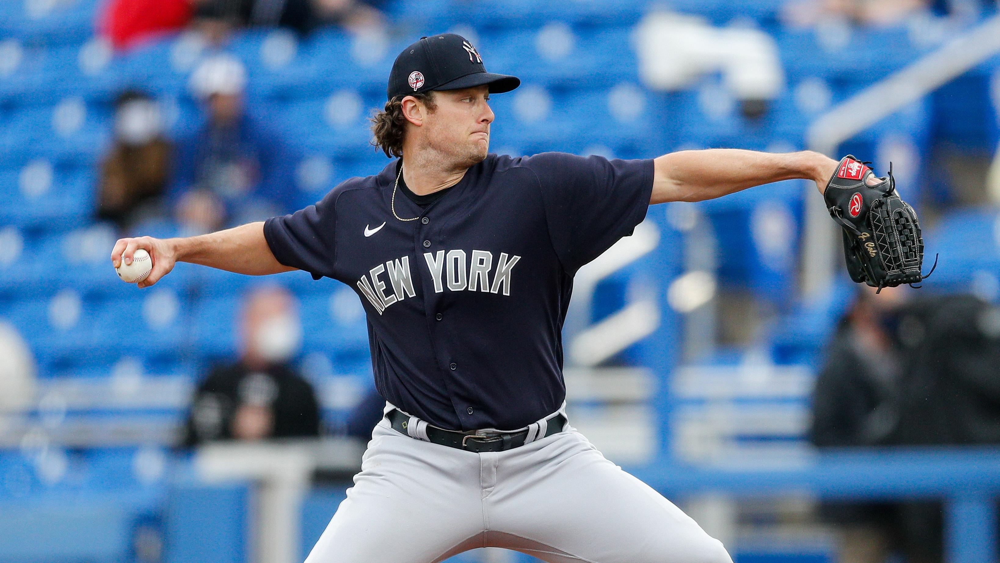 New York Yankees starting pitcher Gerrit Cole (45) pitches in the first inning against the Toronto Blue Jays during spring training at TD Ballpark. / USA TODAY Sports