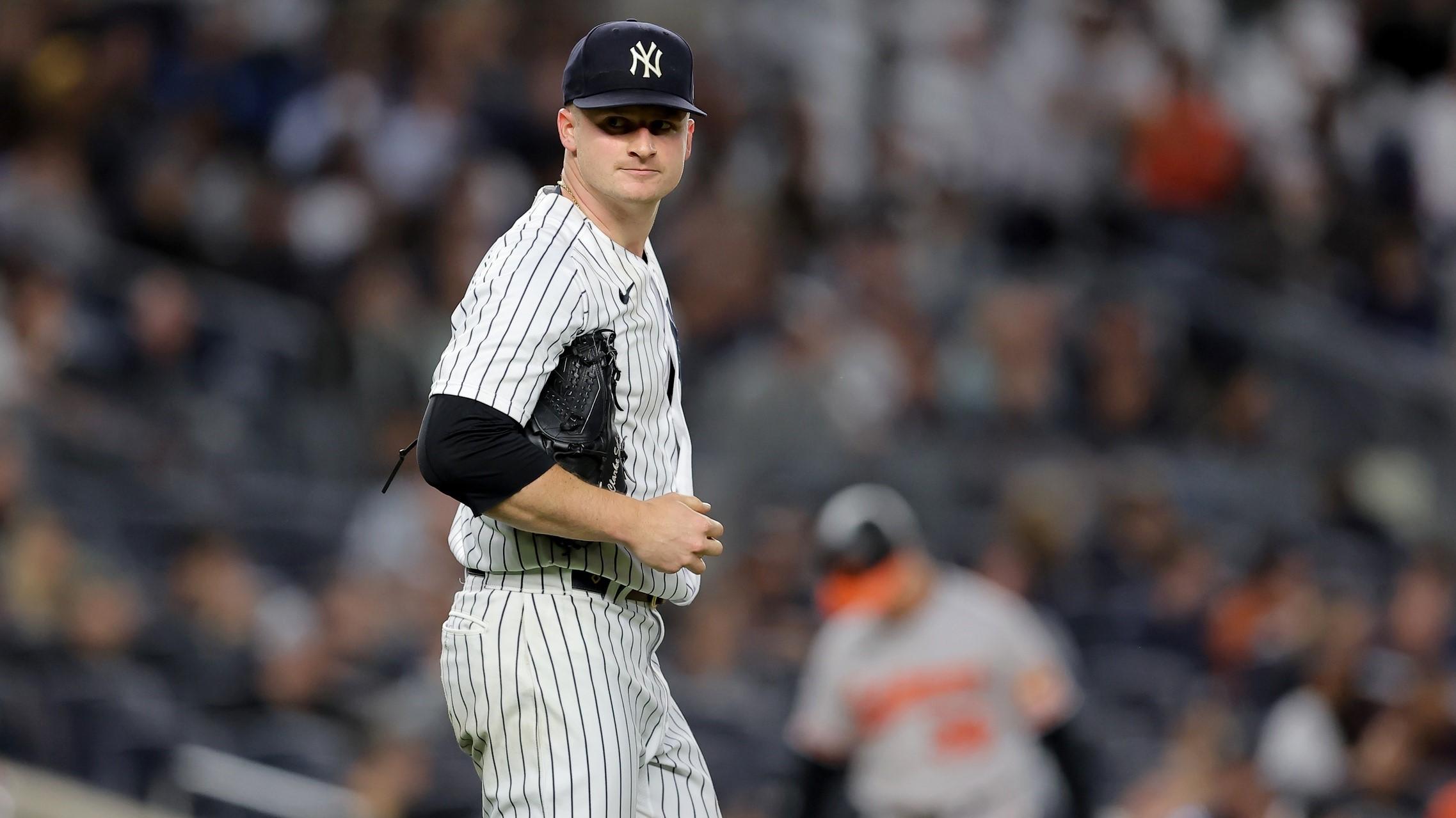 May 25, 2023; Bronx, New York, USA; New York Yankees starting pitcher Clarke Schmidt (36) reacts after allowing a run during the fifth inning against the Baltimore Orioles at Yankee Stadium. / Brad Penner-USA TODAY Sports