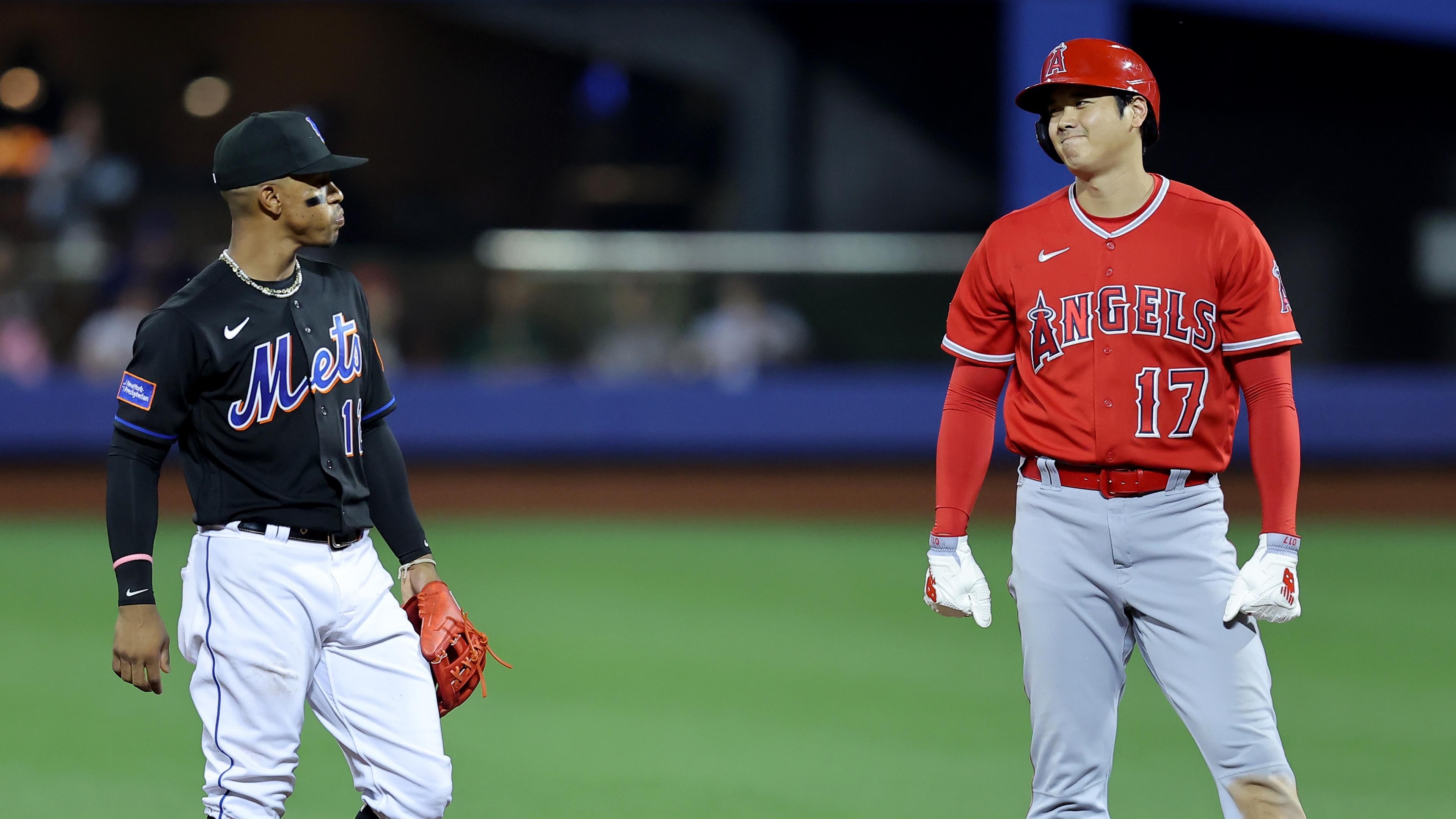 Los Angeles Angels designated hitter Shohei Ohtani (17) talks to New York Mets shortstop Francisco Lindor (12) at second base during the fifth inning at Citi Field / Brad Penner - USA TODAY Sports