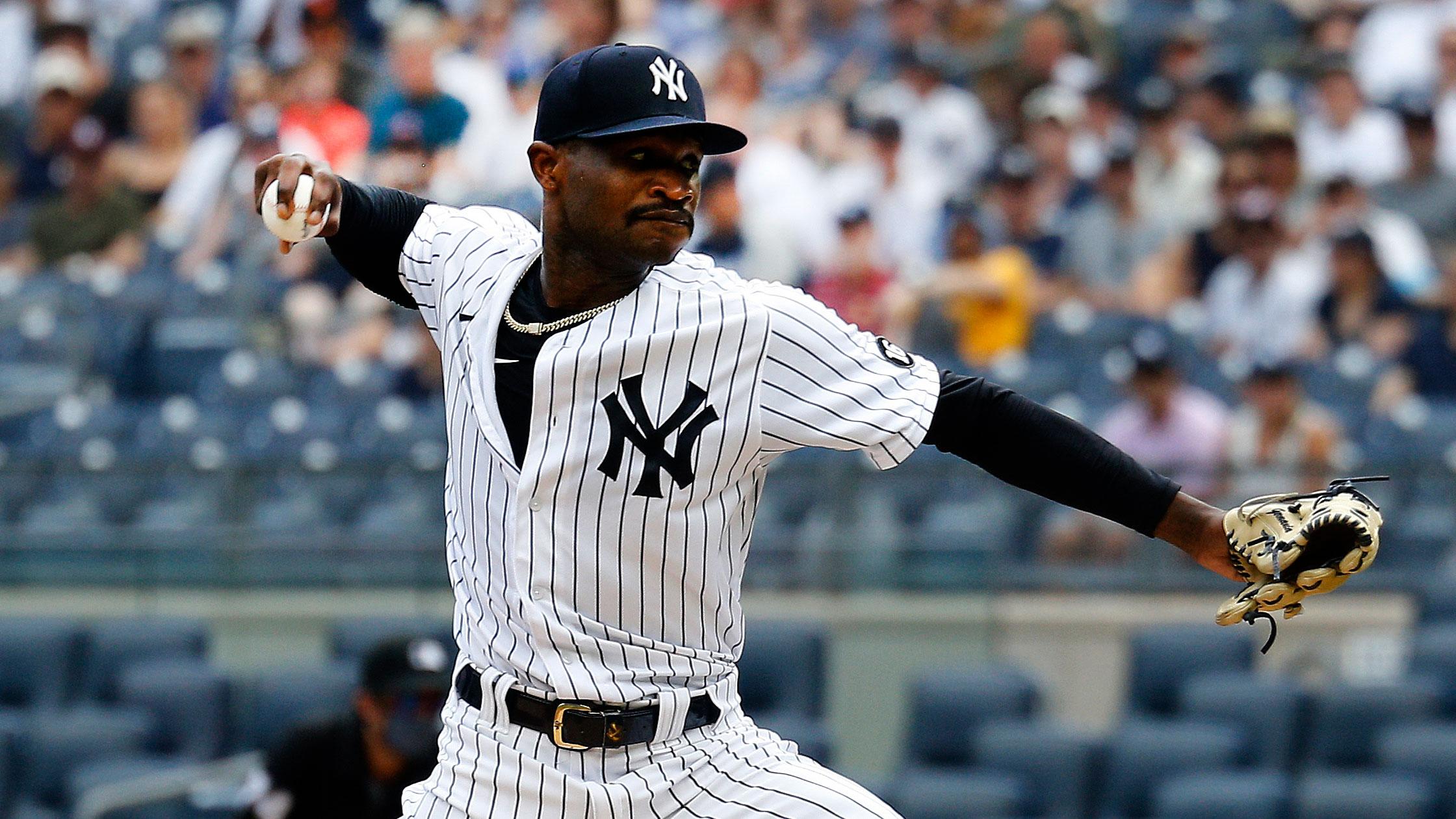 Jun 19, 2021; Bronx, New York, USA; New York Yankees starting pitcher Domingo German (55) pitches against the Oakland Athletics during the first inning at Yankee Stadium. / Andy Marlin-USA TODAY Sports