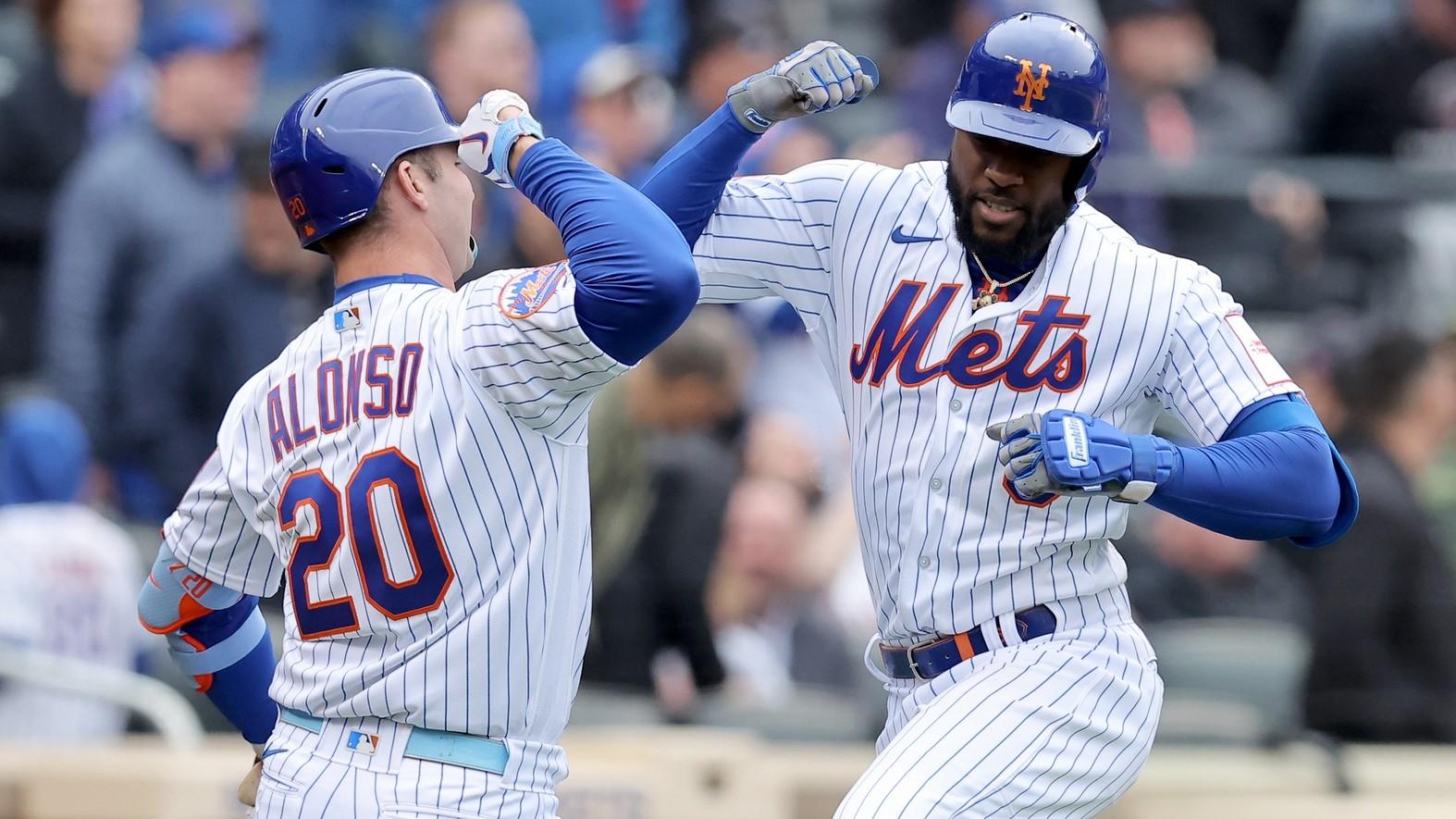 Apr 7, 2023; New York City, New York, USA; New York Mets right fielder Starling Marte (6) celebrates his solo home run against the Miami Marlins with first baseman Pete Alonso (20) during the sixth inning at Citi Field. / Brad Penner-USA TODAY Sports