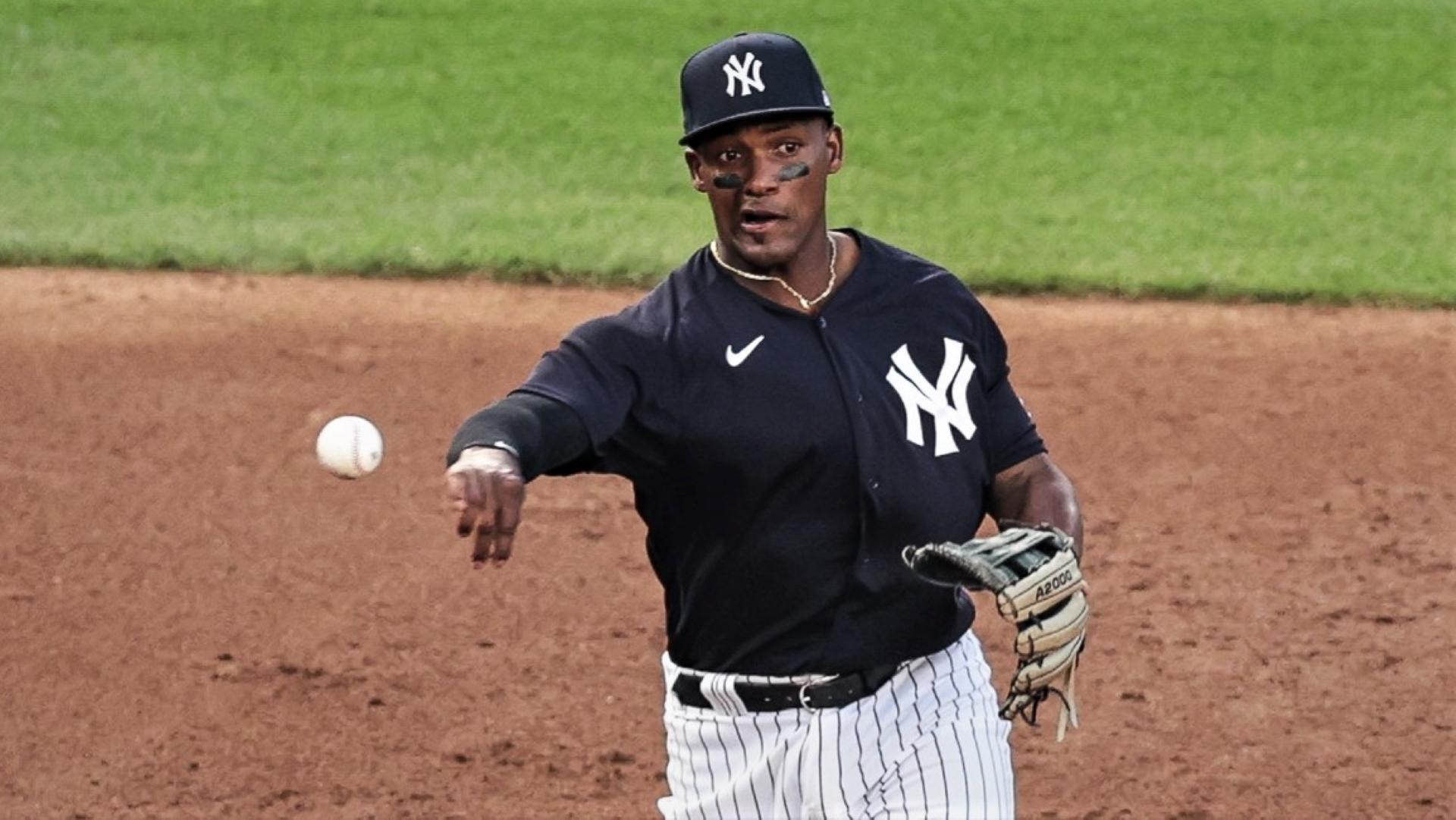 Miguel Andujar makes a throw to first base / USA TODAY