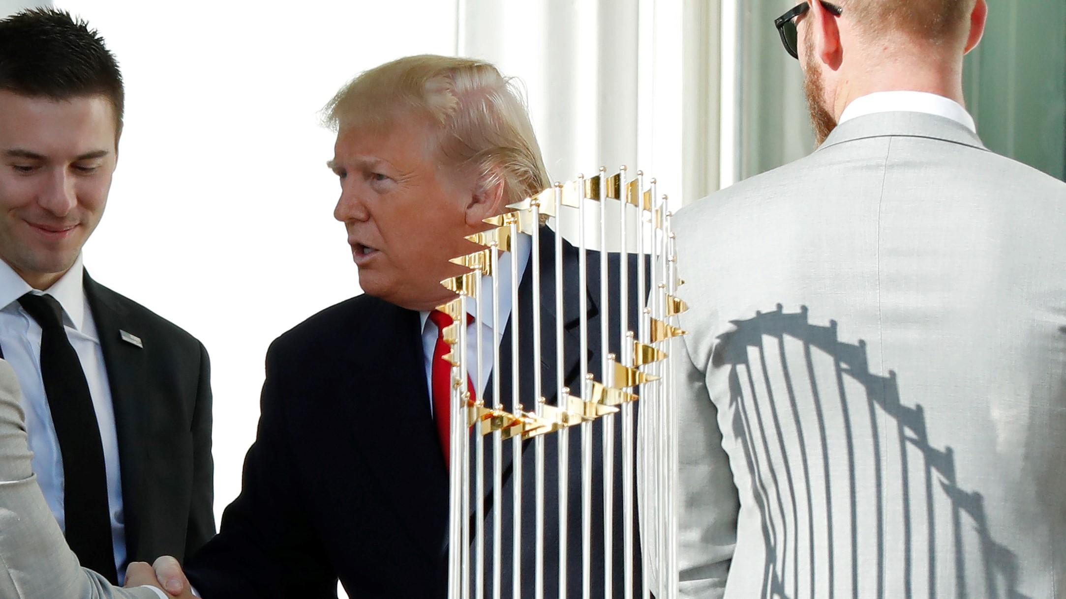 Nov 4, 2019; Washington, D.C., USA; President Donald Trump, (M) shakes hands with Washington Nationals starting pitcher Anibal Sanchez (L) as Nationals starting pitcher Patrick Corbin (M-L) and Nationals starting pitcher Stephen Strasburg (R) look on during a ceremony honoring the 2019 World Series champion Nationals on the South Portico at The White House. Mandatory Credit: Geoff Burke-USA TODAY Sports / Geoff Burke-USA TODAY Sports