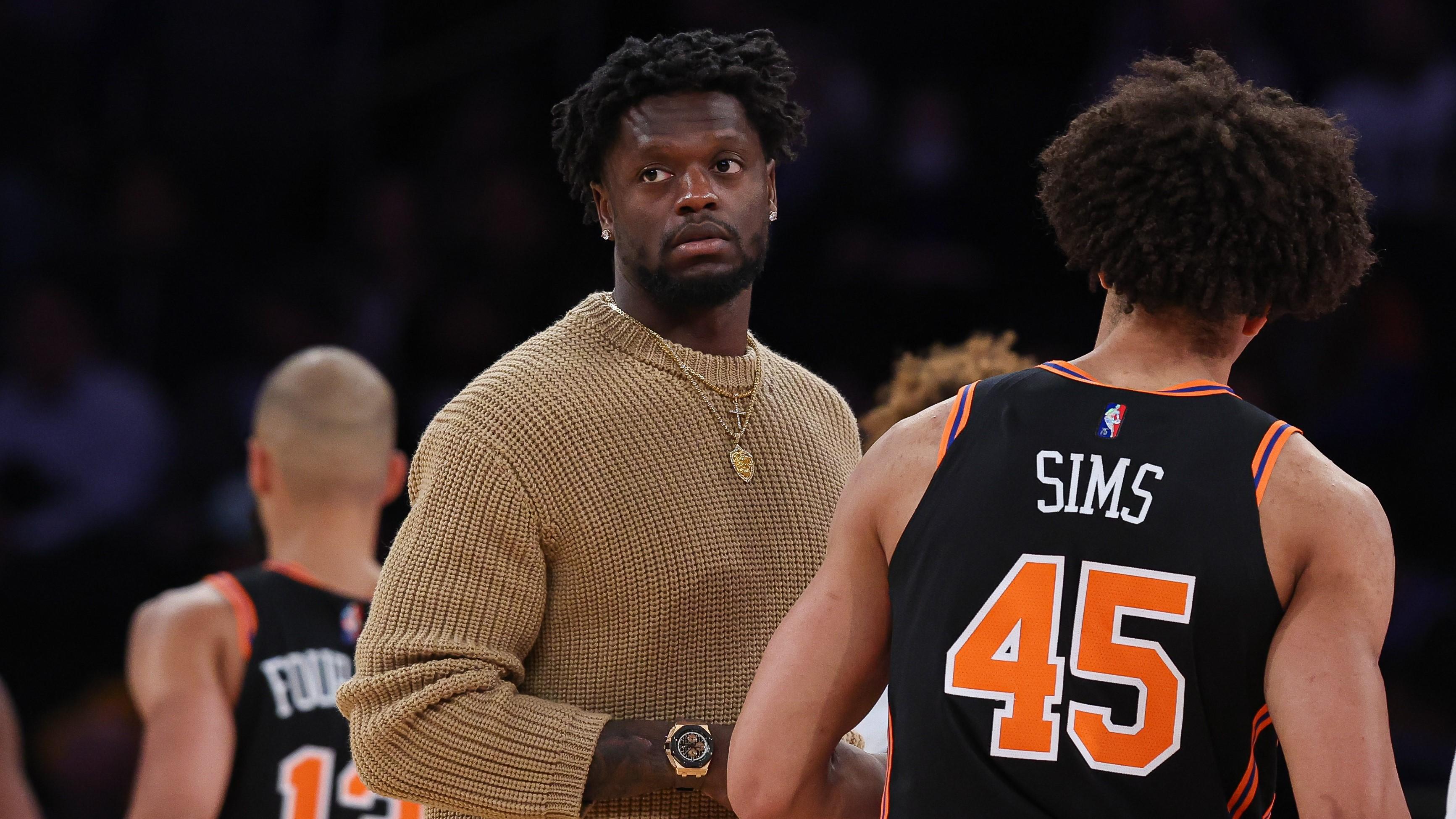 Mar 22, 2022; New York, New York, USA; New York Knicks forward Julius Randle (left) looks on during the first half against the Atlanta Hawks in front of forward Jericho Sims (45) at Madison Square Garden / Vincent Carchietta-USA TODAY Sports