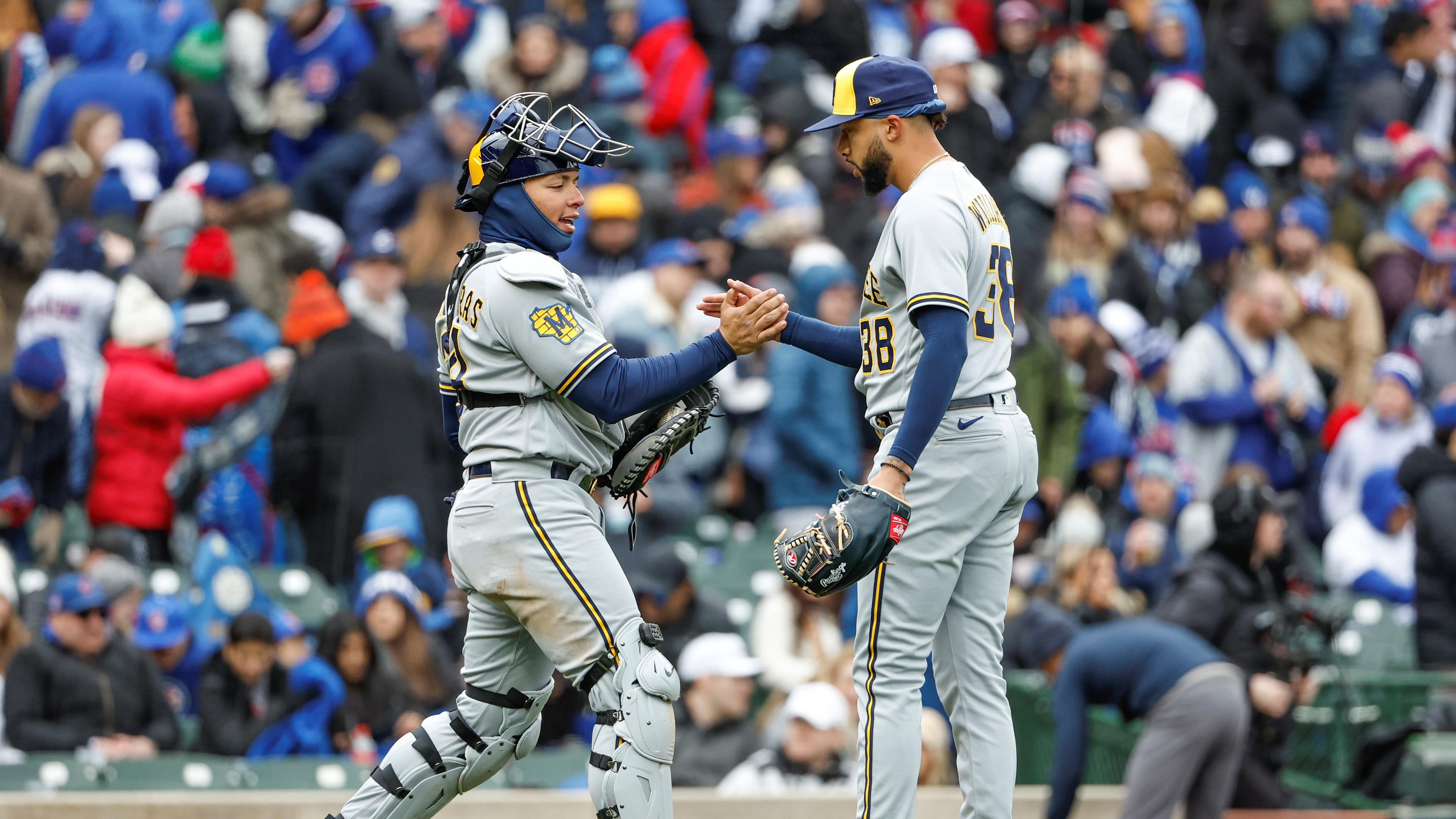 Apr 1, 2023; Chicago, Illinois, USA; Milwaukee Brewers relief pitcher Devin Williams (38) celebrates with catcher William Contreras (24) teams win against the Chicago Cubs at Wrigley Field. Mandatory Credit: Kamil Krzaczynski-USA TODAY Sports / © Kamil Krzaczynski-USA TODAY Sports