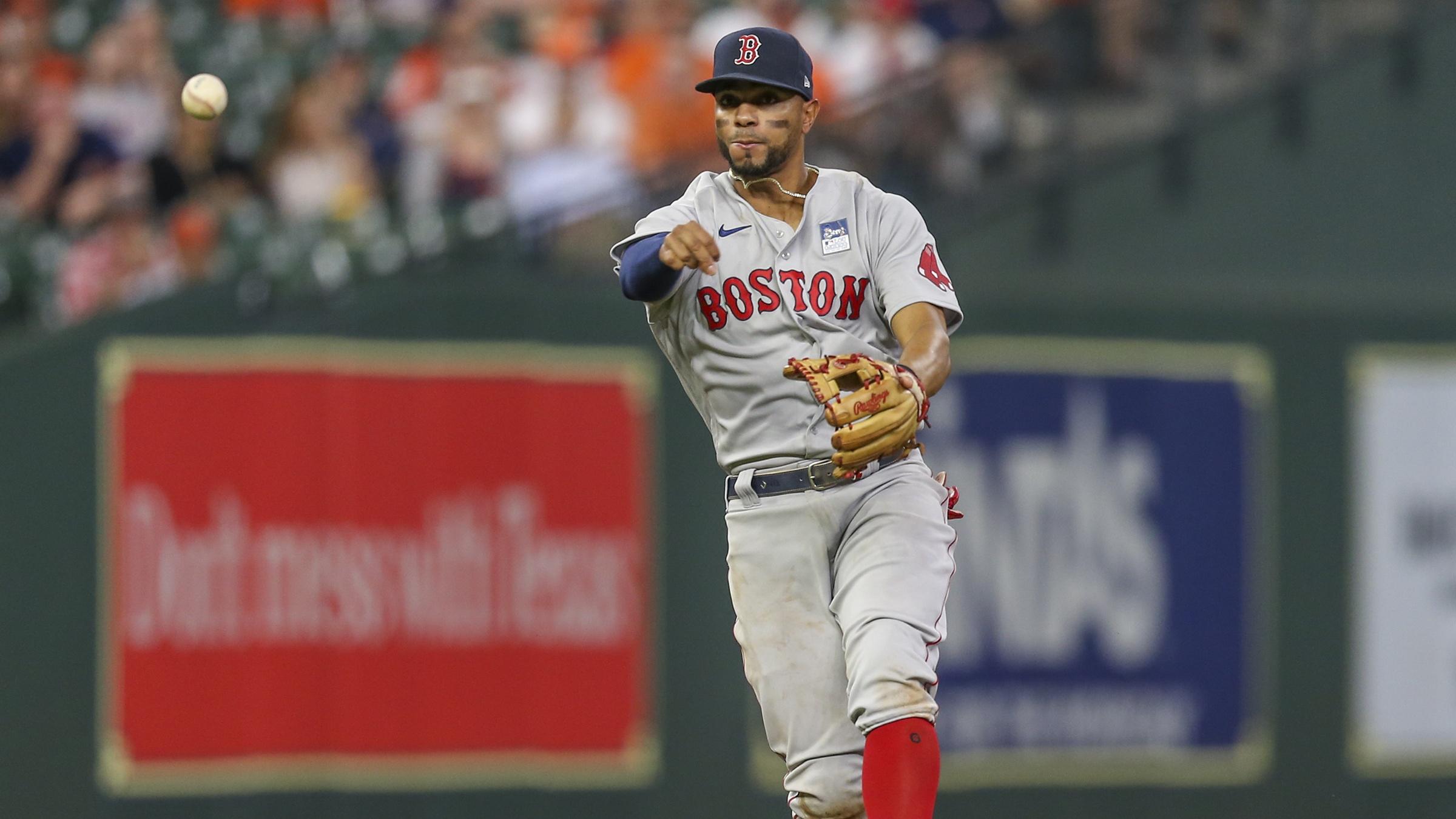 Jun 2, 2021; Houston, Texas, USA; Boston Red Sox shortstop Xander Bogaerts (2) throws out a Houston Astros in the eighth inning at Minute Maid Park. / © Thomas Shea-USA TODAY Sports