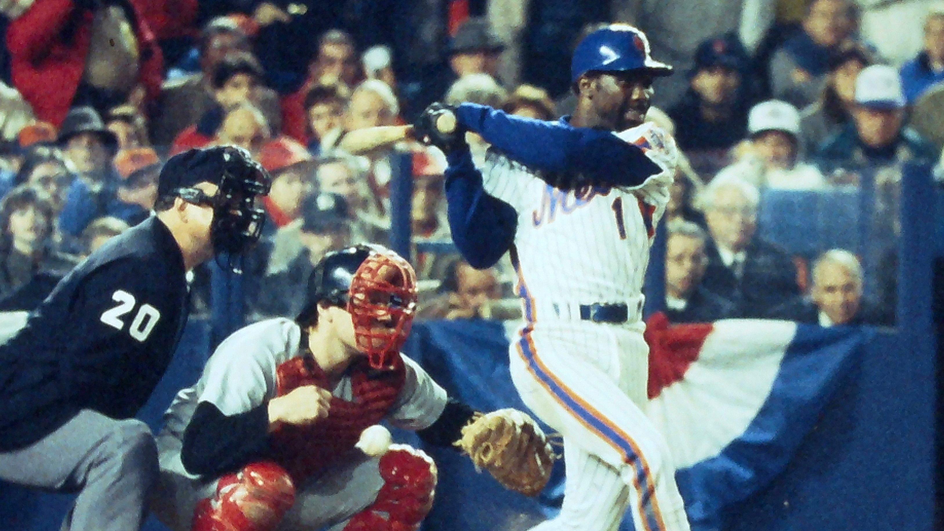 Mets' Mookie Wilson hits a slow grounder up the first base line that gets by Red Sox first basemen Bill Buckner scoring Ray Knight from second to give the Mets the walk off victory in the bottom of the 10th inning during Game 6 of the World Series at Shea Stadium Oct. 25, 1986. / © Frank Becerra Jr/USA TODAY / USA TODAY NETWORK