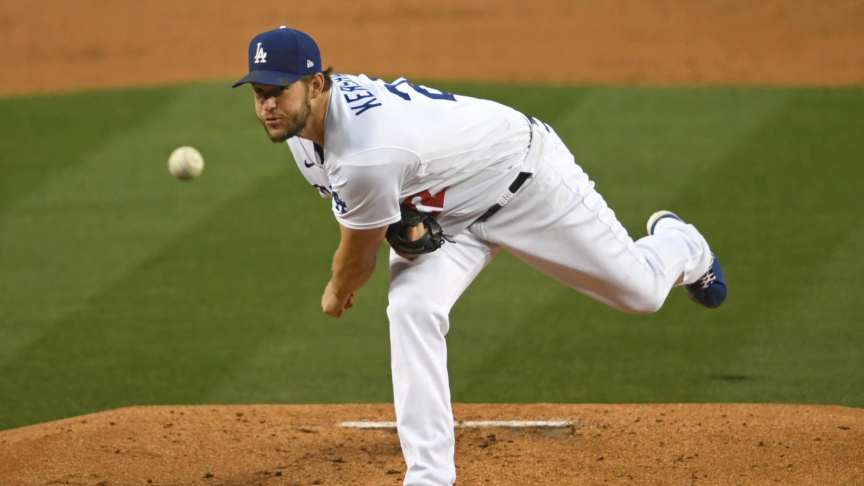 Los Angeles, California, USA; Los Angeles Dodgers starting pitcher Clayton Kershaw (22) pitches in the second inning of the game against the San Diego Padres at Dodger Stadium. / Jayne Kamin-Oncea-USA TODAY Sports