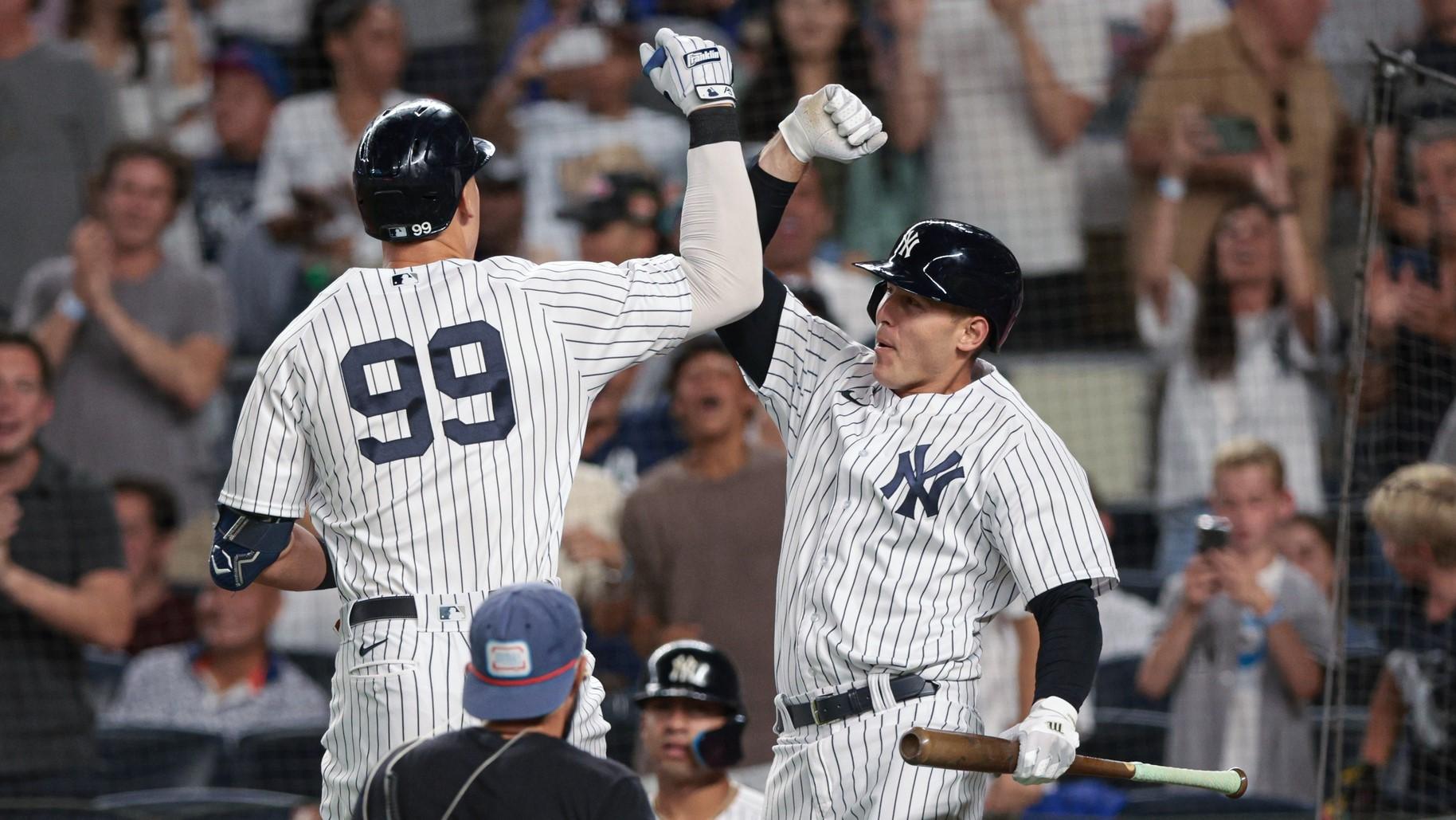 Aug 23, 2022; Bronx, New York, USA; New York Yankees right fielder Aaron Judge (99) celebrates after hitting a solo home run with first baseman Anthony Rizzo (48) during the fourth inning against the New York Mets at Yankee Stadium. / Vincent Carchietta-USA TODAY Sports