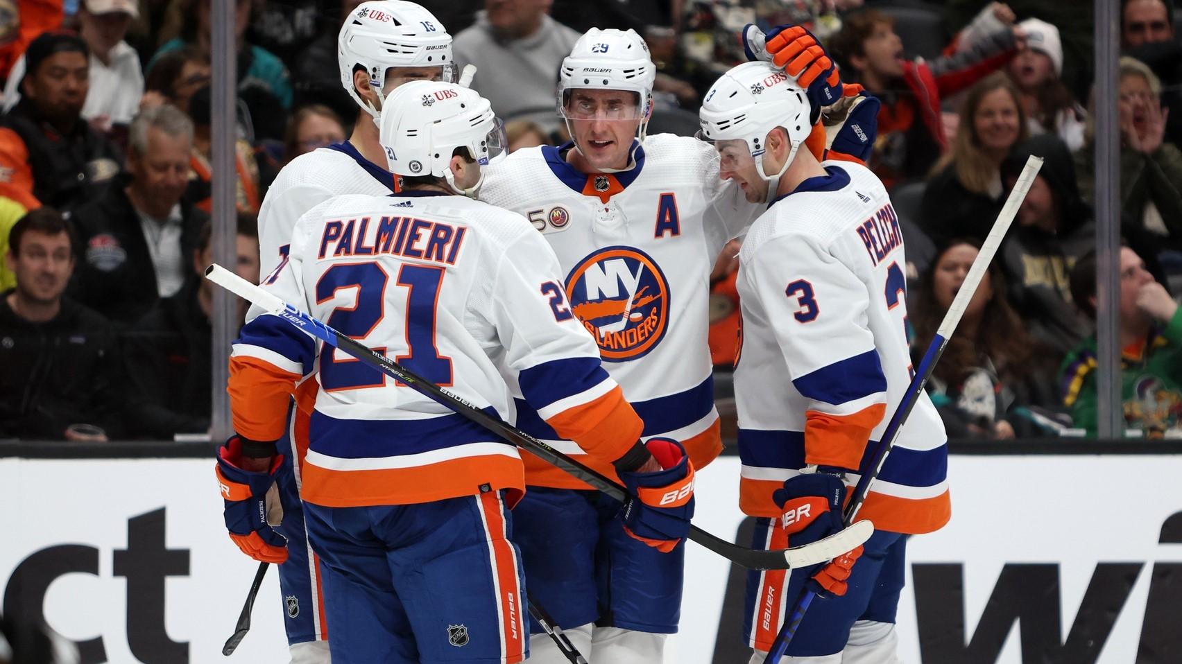 Mar 15, 2023; Anaheim, California, USA; New York Islanders forward Brock Nelson (29) celebrates with teammates after scoring a goal during the second period against the Anaheim Ducks at Honda Center. / Kiyoshi Mio-USA TODAY Sports