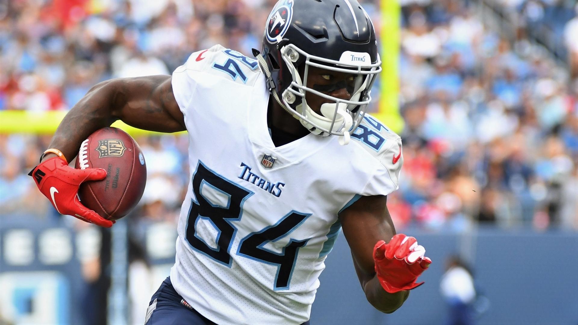 Tennessee Titans wide receiver Corey Davis (84) runs after a catch during the first half against the Houston Texans at Nissan Stadium. Mandatory Credit: Christopher Hanewinckel-USA TODAY Sports / © Christopher Hanewinckel-USA TODAY Sports