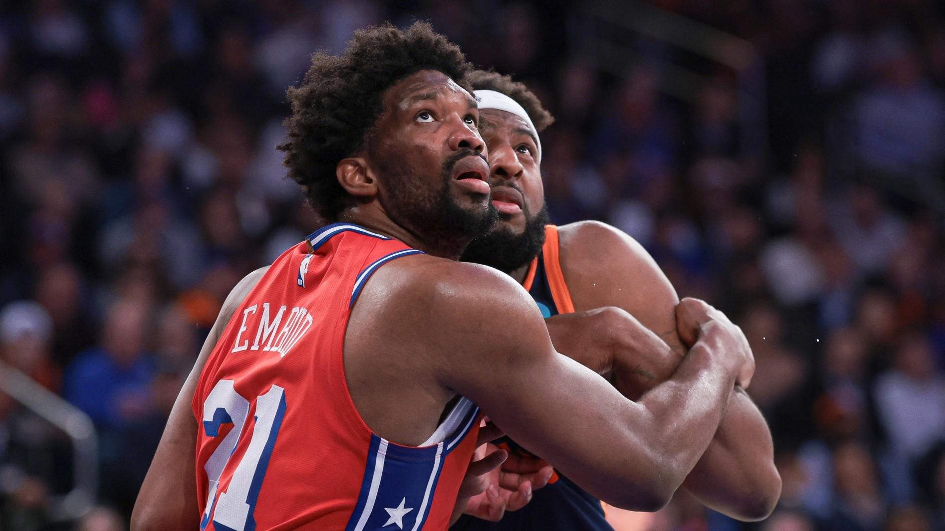 Philadelphia 76ers center Joel Embiid (21) battles for position against New York Knicks center Mitchell Robinson (23) during the second half during game two of the first round for the 2024 NBA playoffs at Madison Square Garden. / Vincent Carchietta-USA TODAY Sports