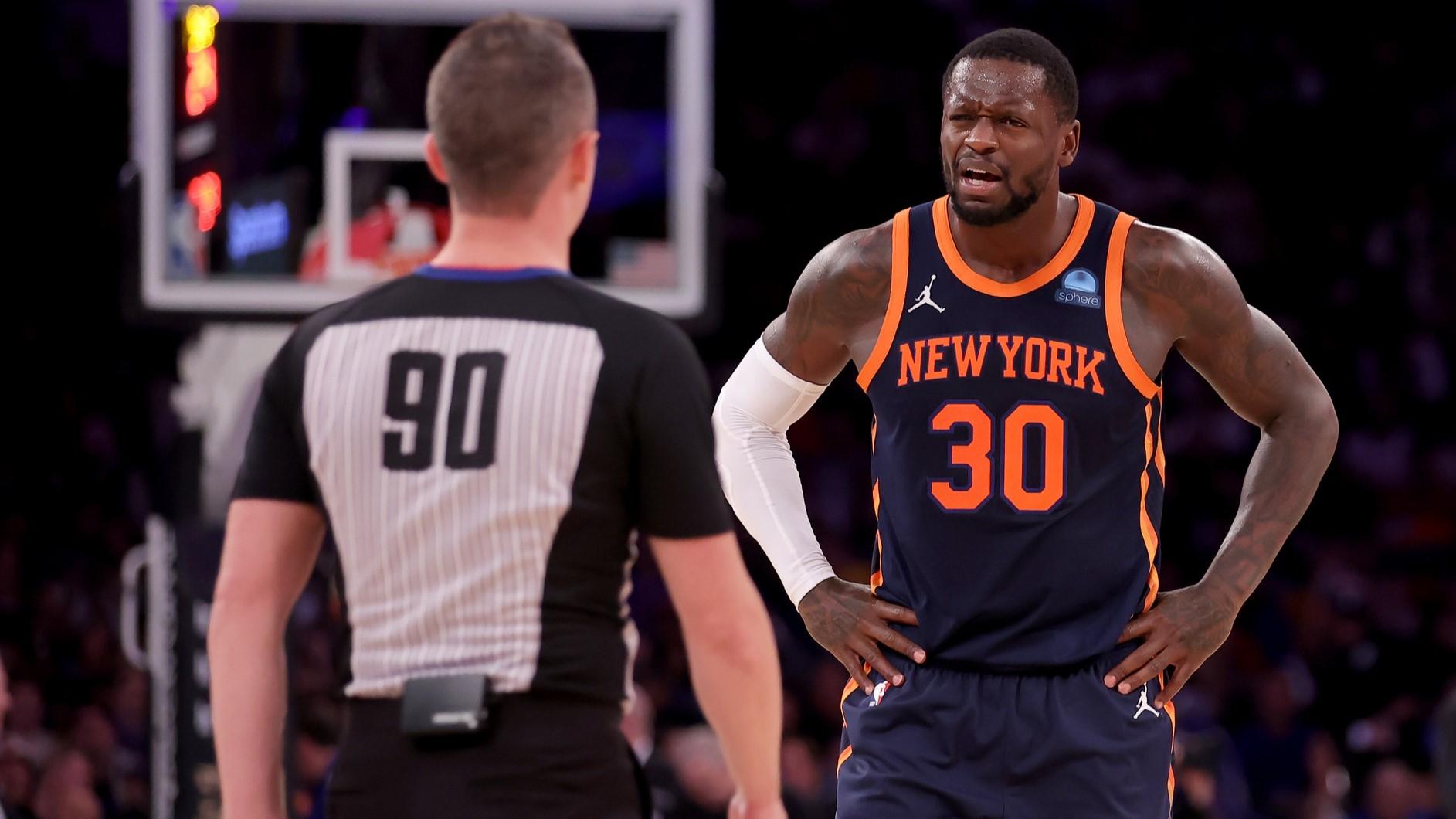 Nov 1, 2023; New York, New York, USA; New York Knicks forward Julius Randle (30) argues with referee Pat O Connell (90) after being called for a foul during the third quarter against the Cleveland Cavaliers at Madison Square Garden. / Brad Penner-USA TODAY Sports