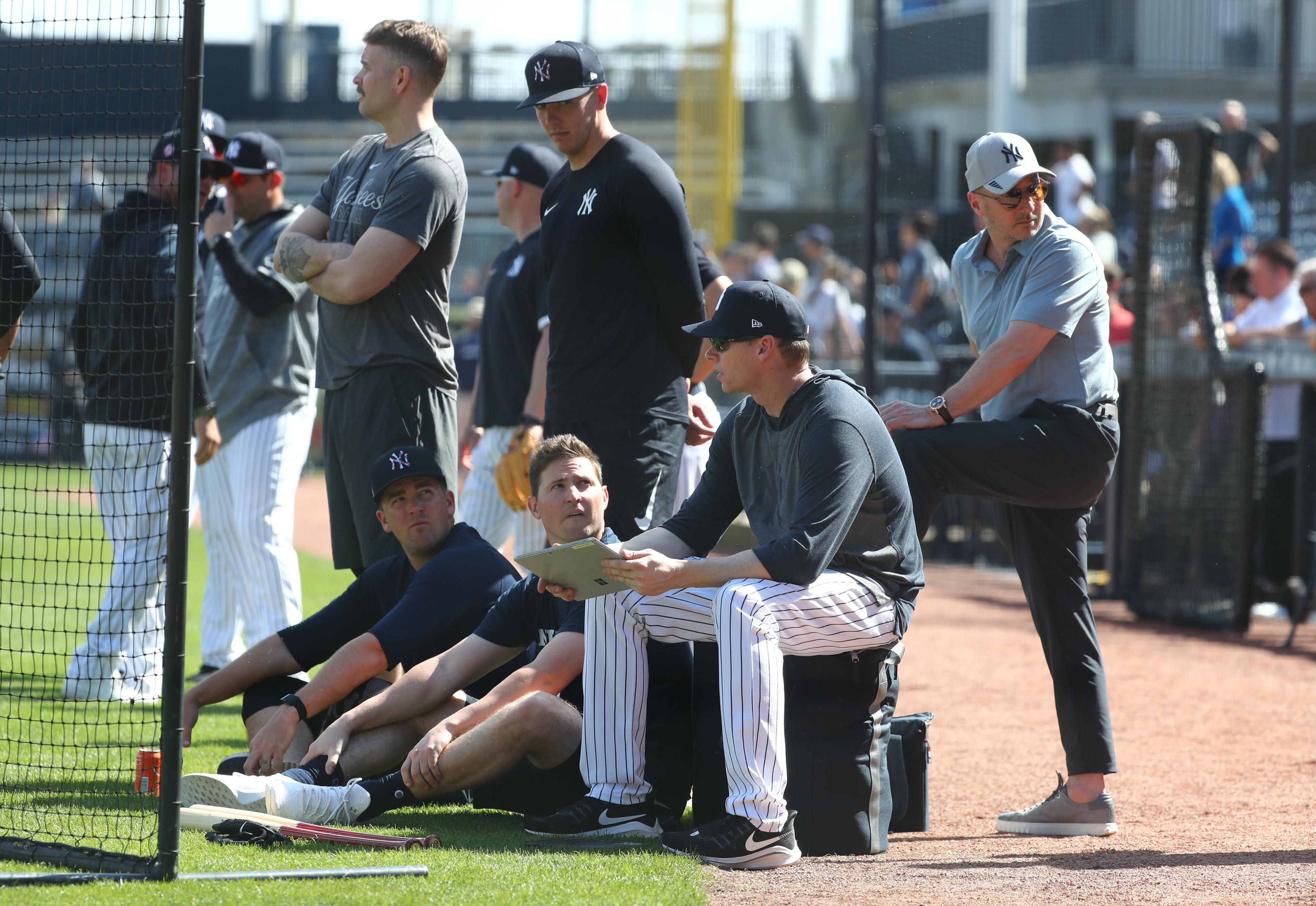 Feb 16, 2020; Tampa, Florida, USA; New York Yankees relief pitcher Zack Britton (53), New York Yankees relief pitcher Chad Green (57), New York Yankees starting pitcher James Paxton (65), general manager Brian Cashman watch live batting practice during spring training at George M. Steinbrenner Field. Mandatory Credit: Kim Klement-USA TODAY Sports / © Kim Klement-USA TODAY Sports